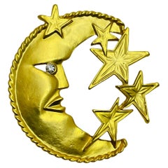 Broche vintage de diseño con estrellas lunares macizas de strass en tono dorado mate