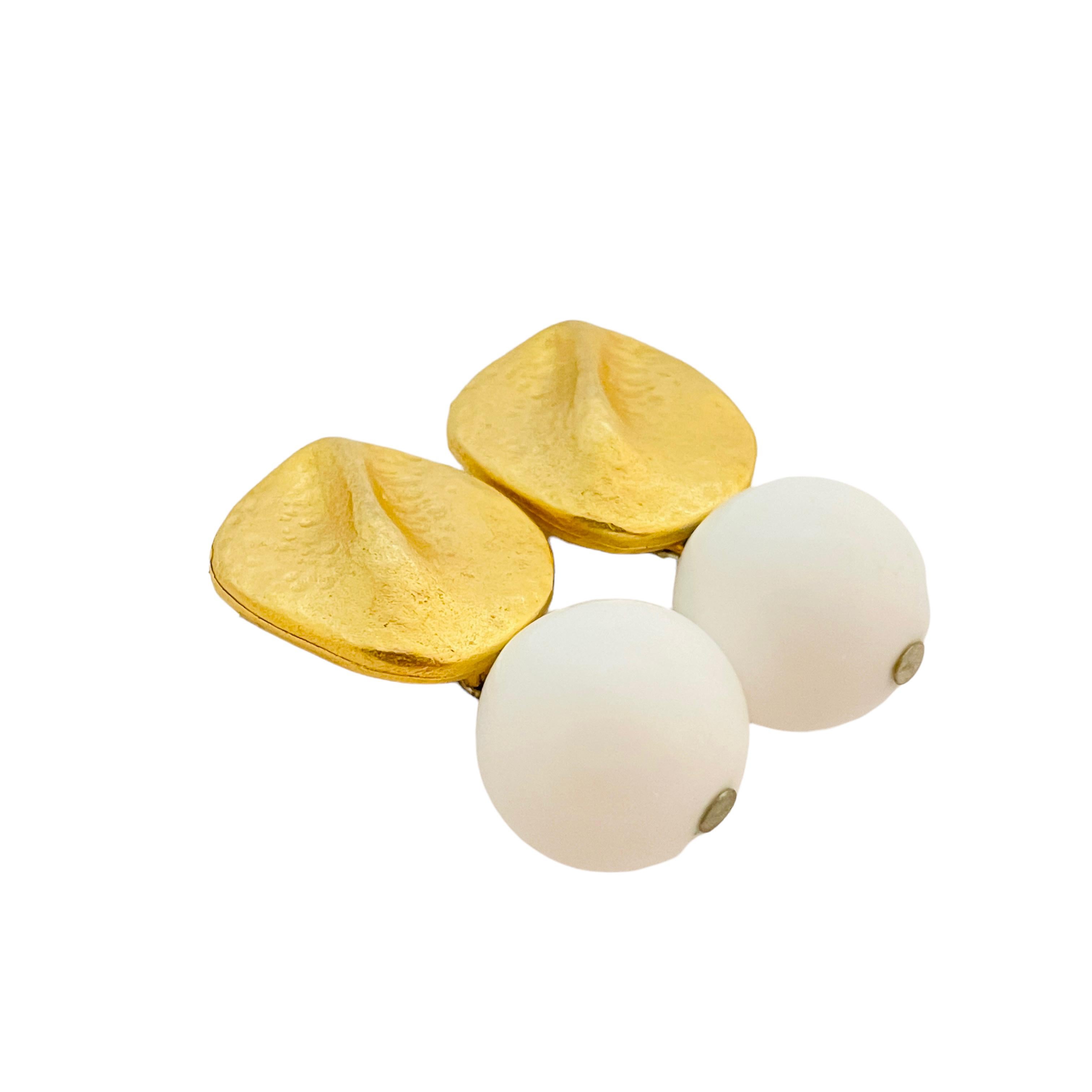 Women's or Men's Vintage matte gold tone white lucite dangle ball designer earrings For Sale