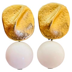 Vintage matte gold tone white lucite dangle ball designer earrings