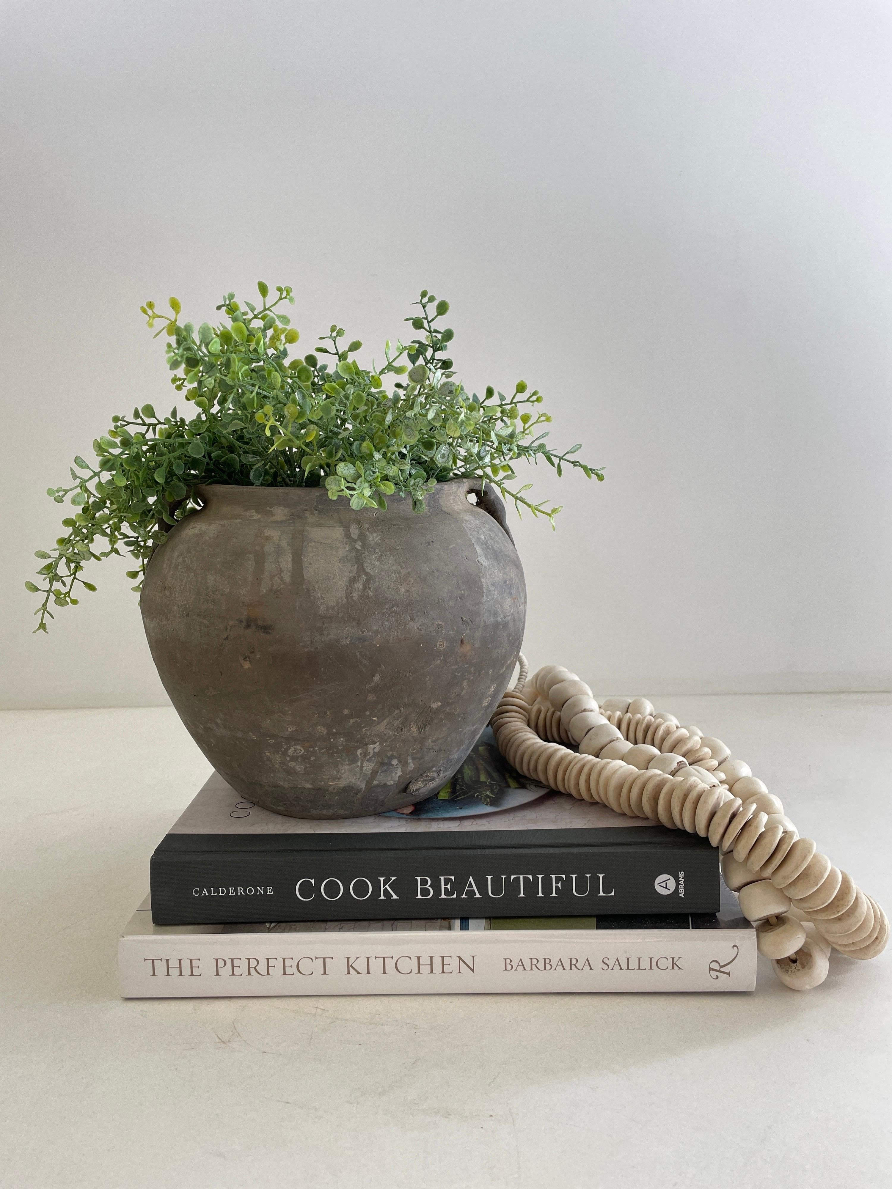 Vintage Matte Oil Pots Pottery
Beautifully terracotta rich in character, this vintage oil pot adds just the right amount of texture + warmth where you need it. Stunning matte finish with warm terra-cotta accents, and dark grey tones.
Sizing: 9