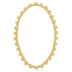 Collar gargantilla con forma de corazón de Mauboussin, de oro amarillo de 18 quilates, de los años 80, Francia