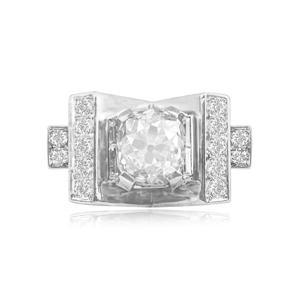 Vintage platinum ring featuring a GIA-certified 3.05ct antique cushion cut diamond (J color, SI2 clarity). Geometric design with two rows of round brilliant cut diamonds on each side of the center stone. Total additional diamond weight approx.