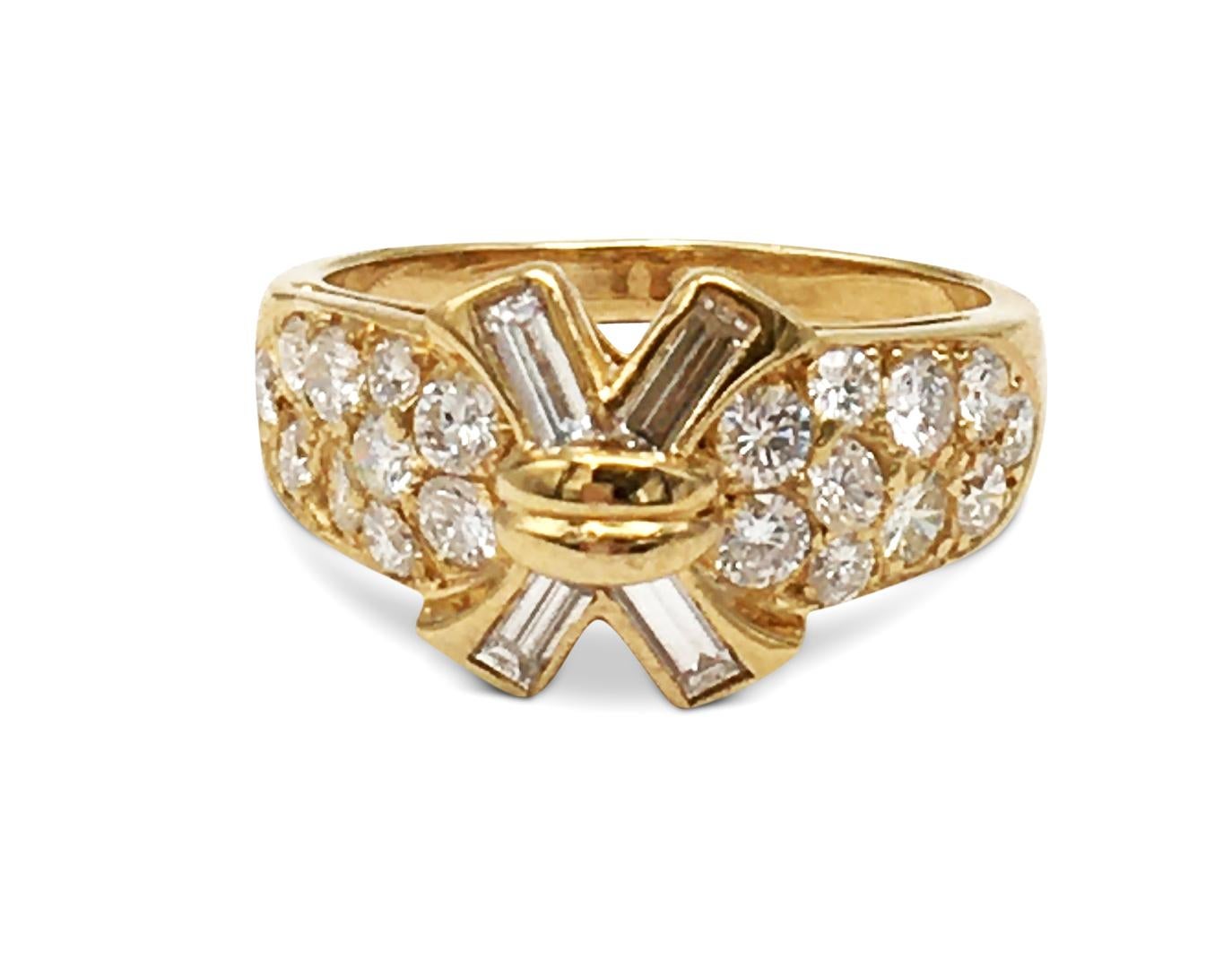 Authentic Mauboussin ring made in 18 karat yellow gold featuring 20 round cut diamonds weighing approximately .07ct each and 4 emerald cut diamonds weighing approximately .16ct each. Size 8.  Mauboussin stamp is faint and partially rubbed, but