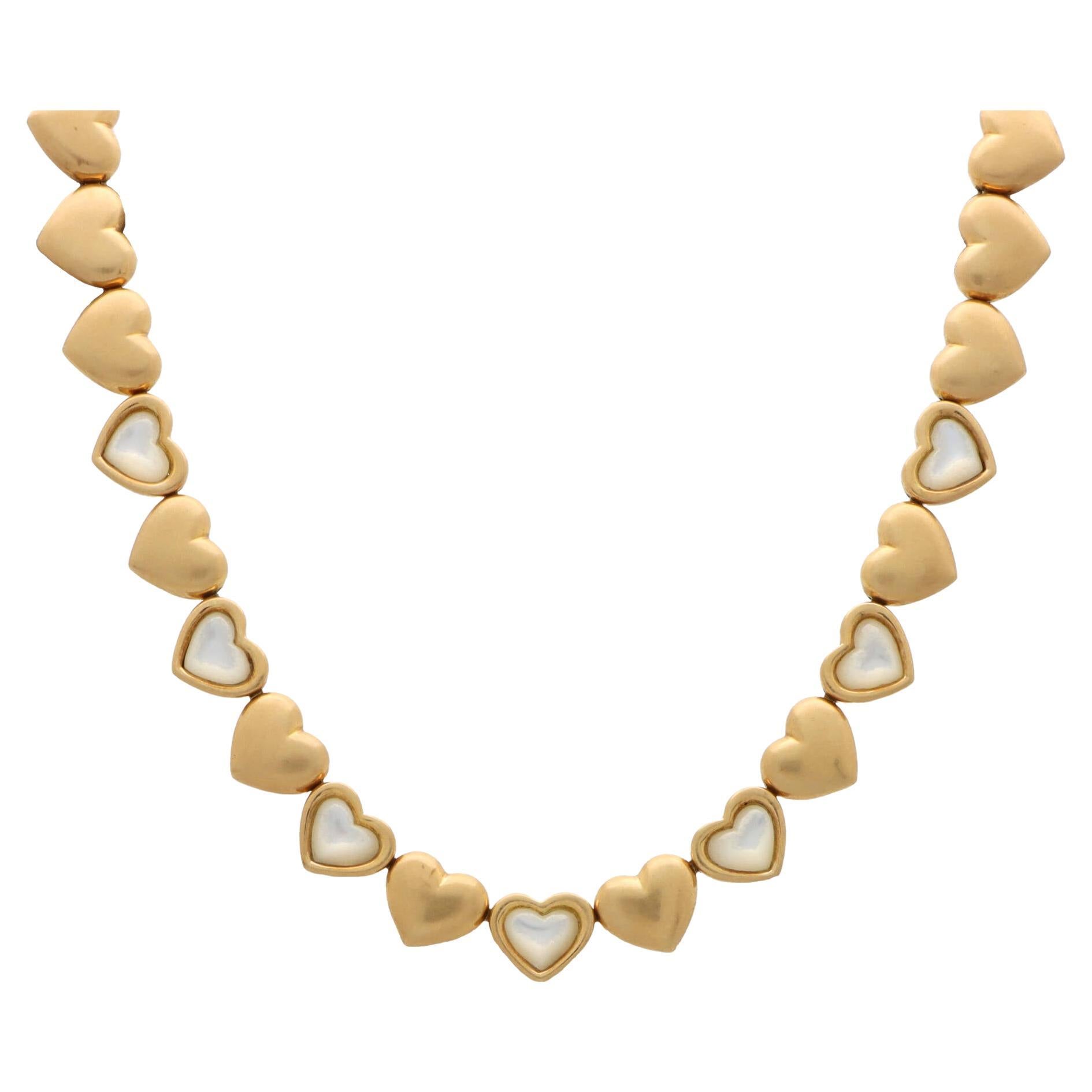 Vintage Mauboussin Mother of Pearl Heart Necklace Set in 18k Yellow Gold For Sale