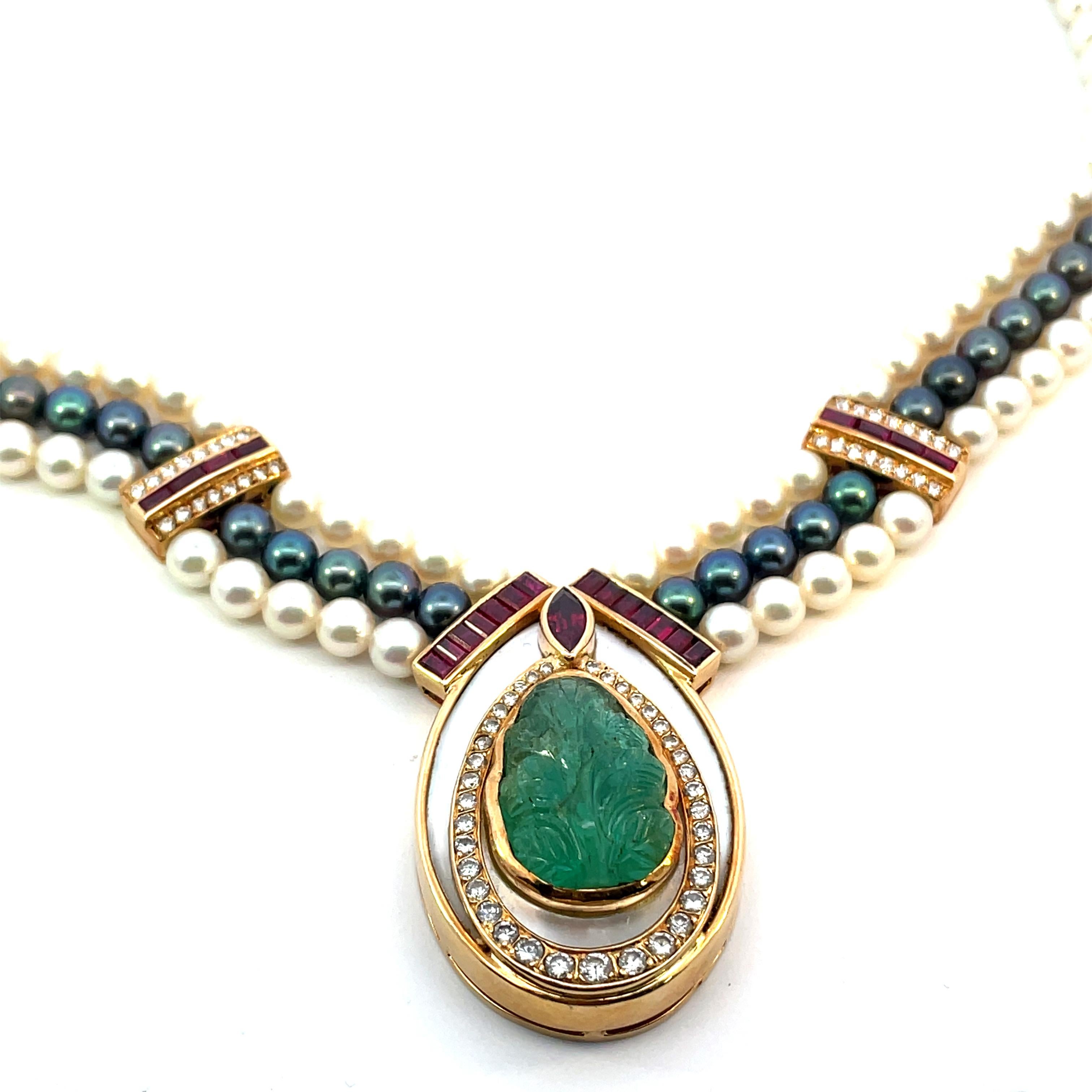 Imagine adorning yourself with a one-of-a-kind Mauboussin Paris necklace, a true masterpiece that mesmerizes with its timeless allure. Nestled at the heart of this necklace is a precious carved emerald, weighing approximately 12 carats, set against