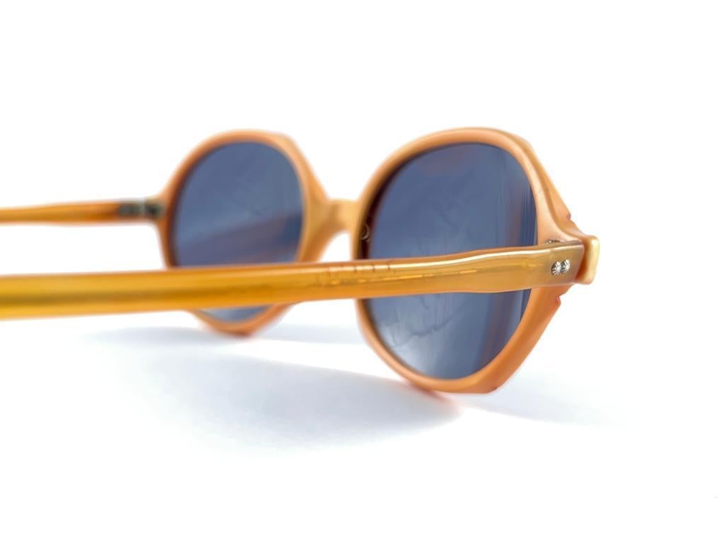 Women's or Men's Vintage May Oval Orange Frame Blue Lens Midcentury Made In Usa 1970'S Sunglasses For Sale