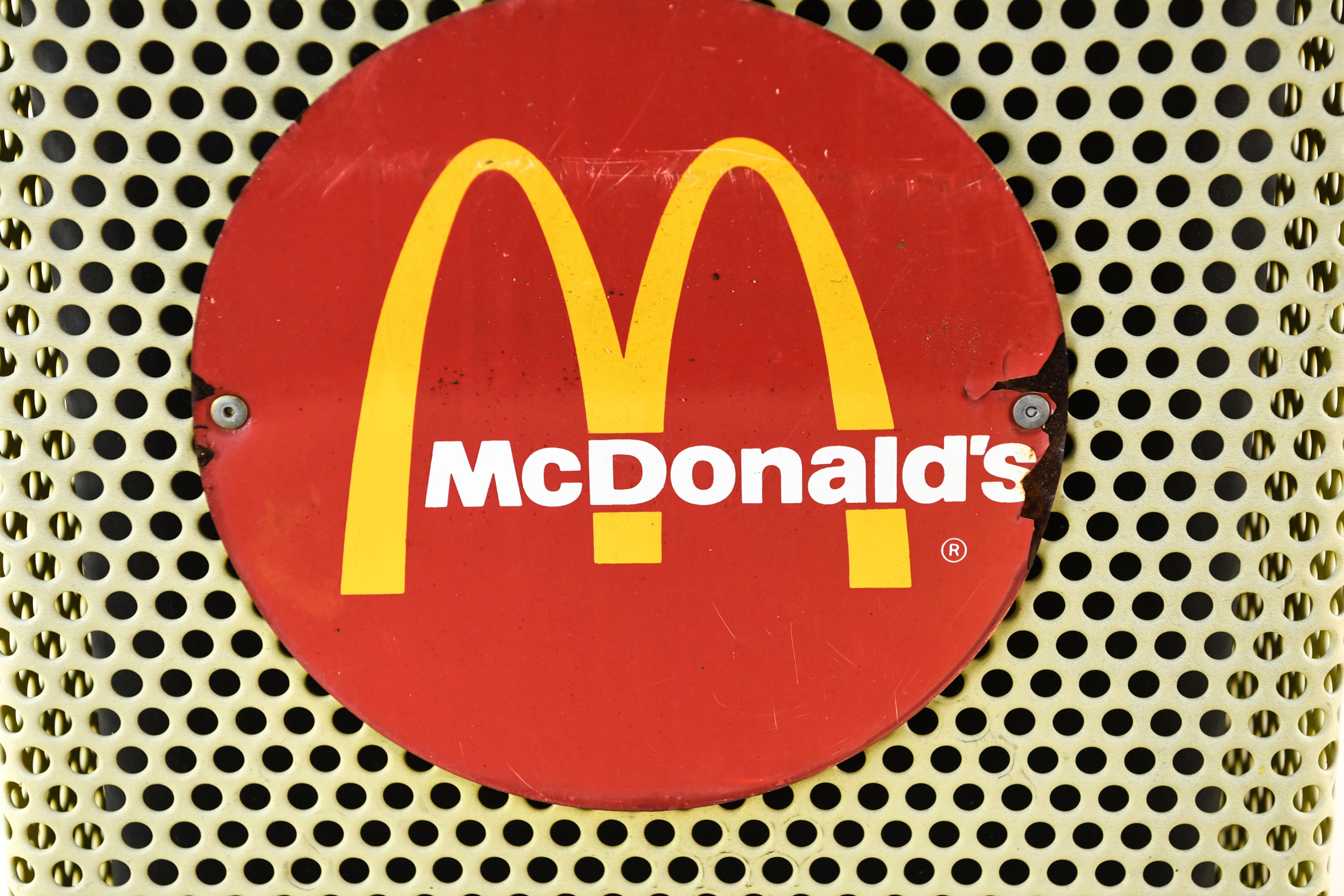 This vintage garbage can from McDonald's would be a humorous piece to include outside or inside a home. Featuring a pierced metal exterior with the classic McDonald's logo.
