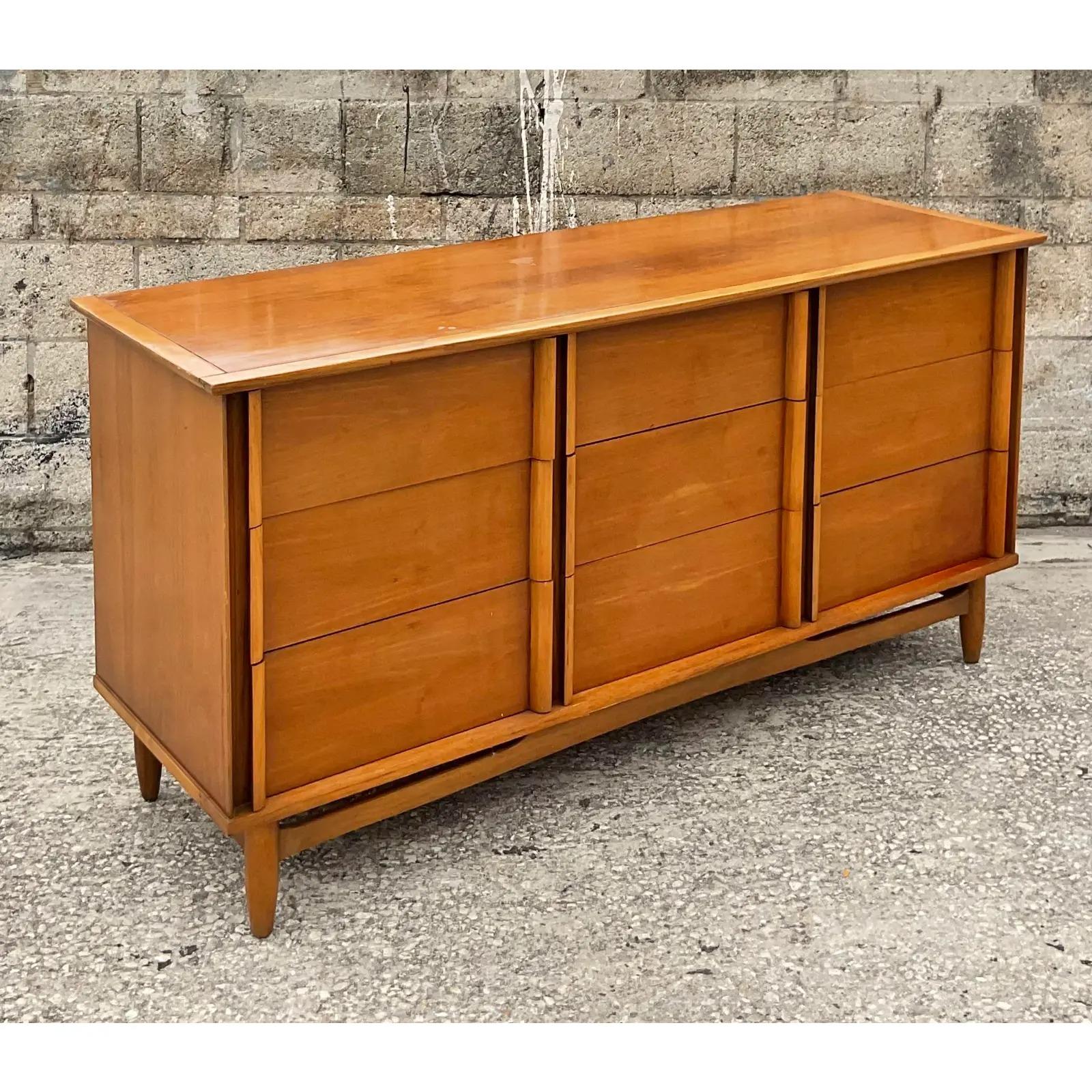 Fantastic vintage MCM 9 drawer dresser. Chic and simple design. Unmarked. Acquired from a Palm Beach estate.