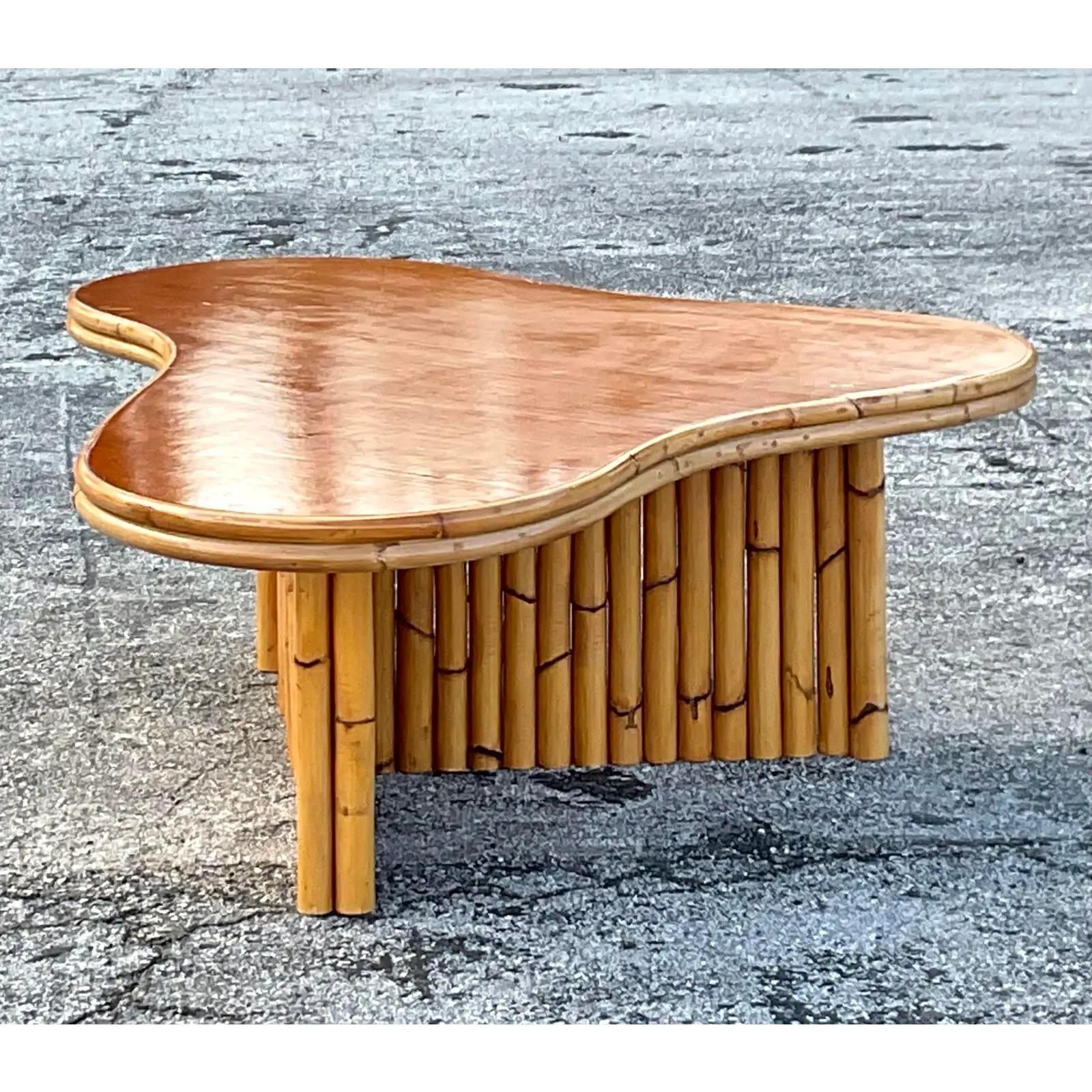 North American Vintage MCM Amoeba Rattan Coffee Table After Frankl For Sale