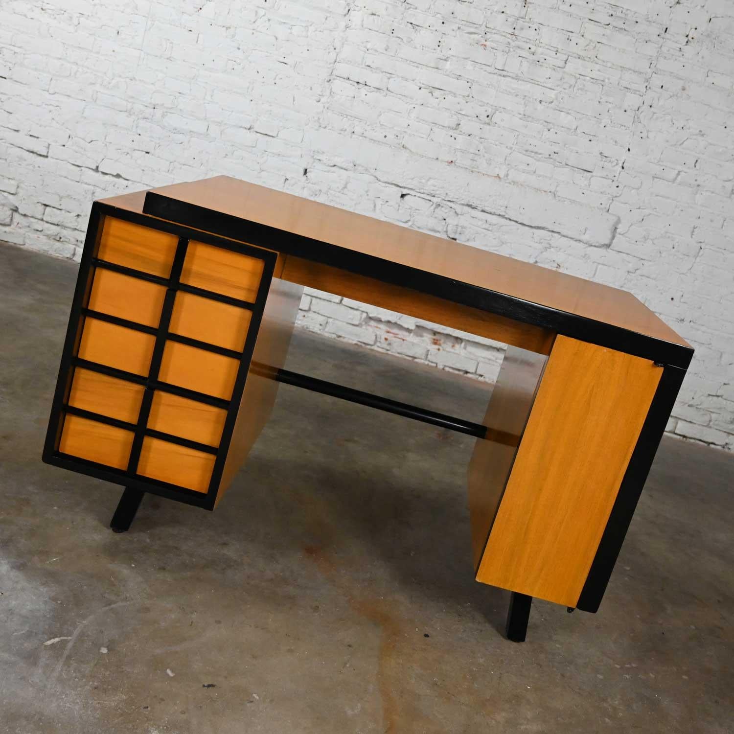 Stunning vintage mid-century modern or Art Deco with an Asian flair maple colored exotic wood desk by American of Martinsville. Beautiful condition, keeping in mind that this is vintage and not new so will have signs of use and wear. We have