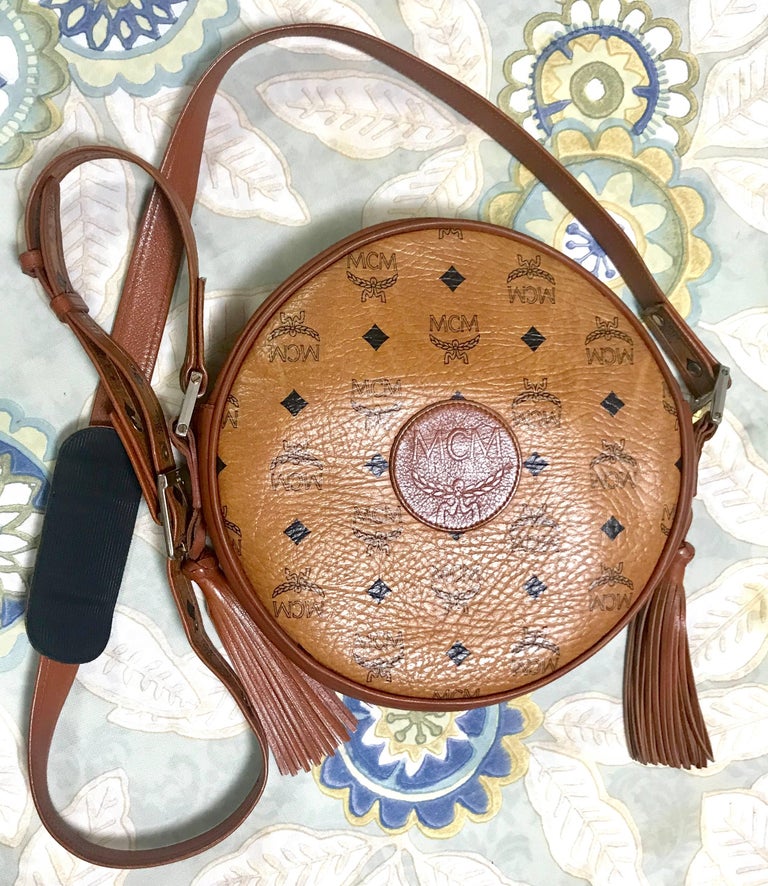 Vintage MCM brown monogram round Suzy Wong shoulder bag with fringes. Classic