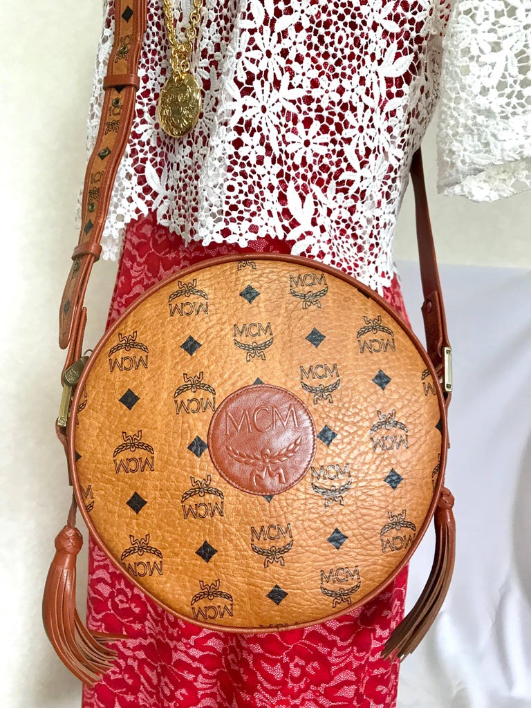 Vintage MCM brown monogram round Suzy Wong shoulder bag with brown lea –  eNdApPi ***where you can find your favorite designer  vintages..authentic, affordable, and lovable.