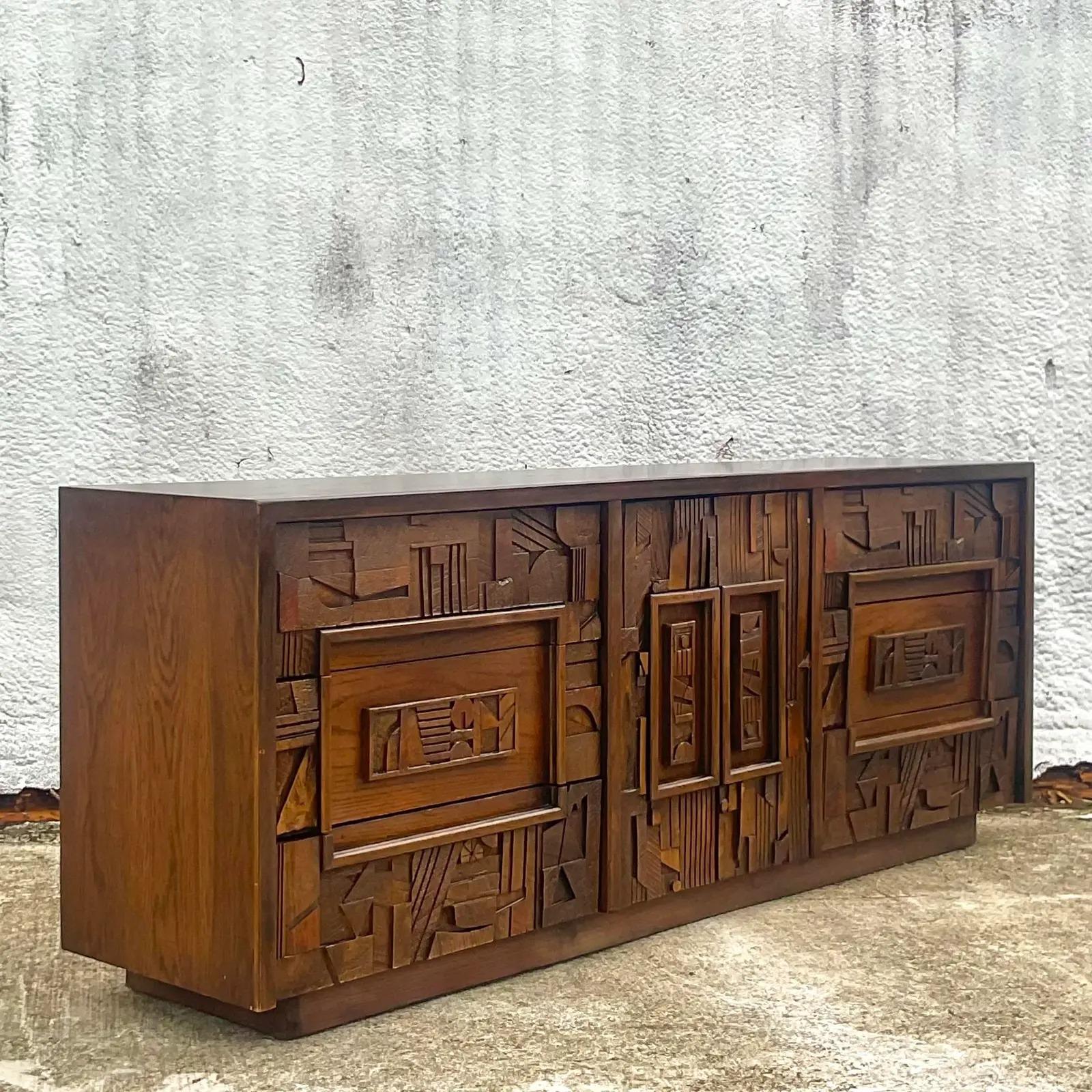 Fantastic vintage MCM credenza. Made by the iconic Lane Furniture group. Part of their coveted “Pueblo” collection. Dark and sexy. Acquired from a Palm Beach estate.