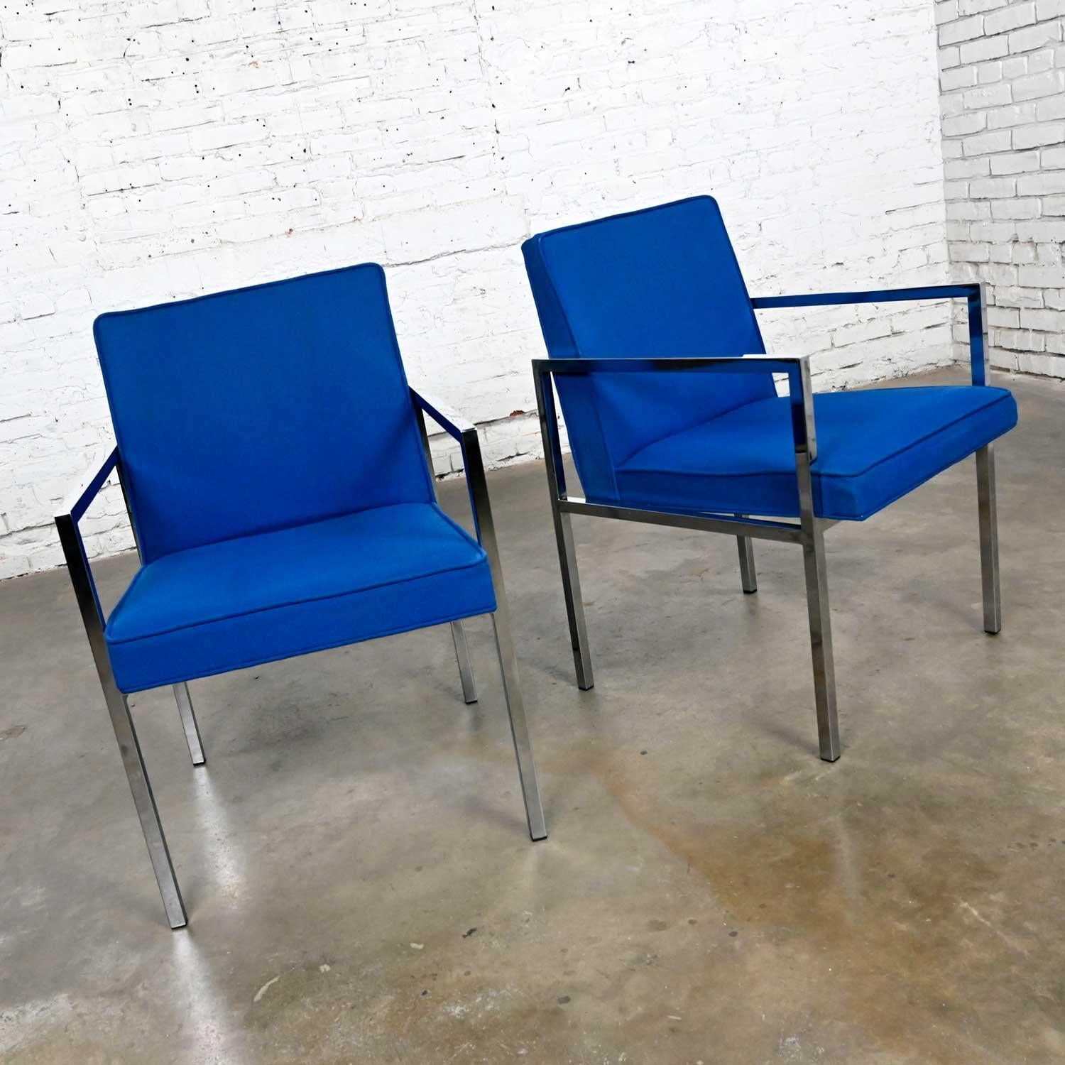 Stunning pair of vintage Mid-Century Modern royal blue and chrome armchairs by Hibriten Chair Company. Beautiful condition, keeping in mind that these are vintage and not new so will have signs of use and wear. The chrome has no pitting that we have
