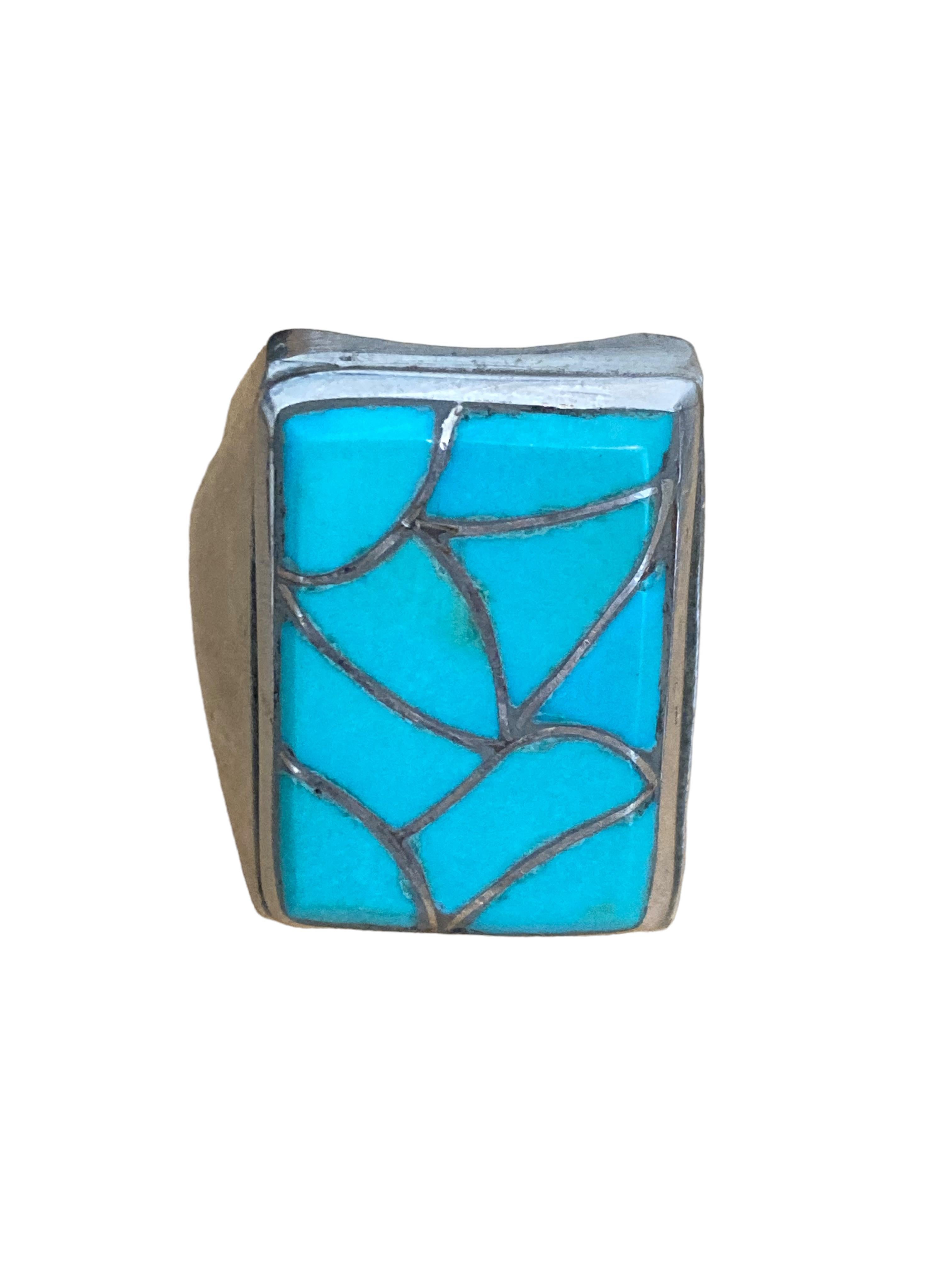 This Vintage, Men's, Native American, Sterling Silver Ring was made by Zuni silversmith Emma Bonney, circa 1960s.  Sleeping Beauty turquoise is no longer mined, resulting in the gem becoming highly desired and valuable. The ring has a handsome,
