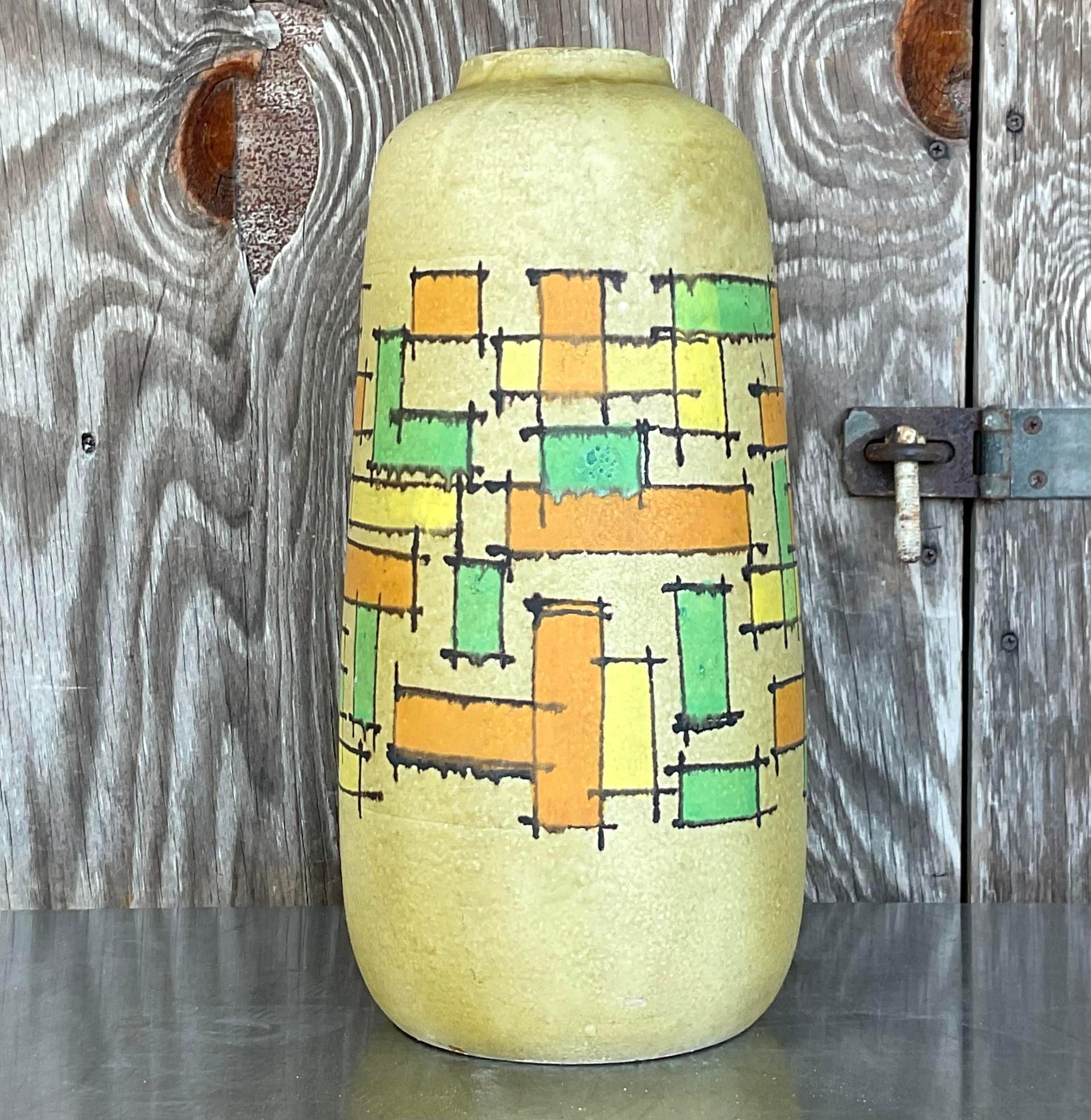 A fabulous vintage boho ceramic vase. Made in Italy. Beautiful hand painted design is period colors. Signed on the bottom. Acquired from a Palm Beach estate.