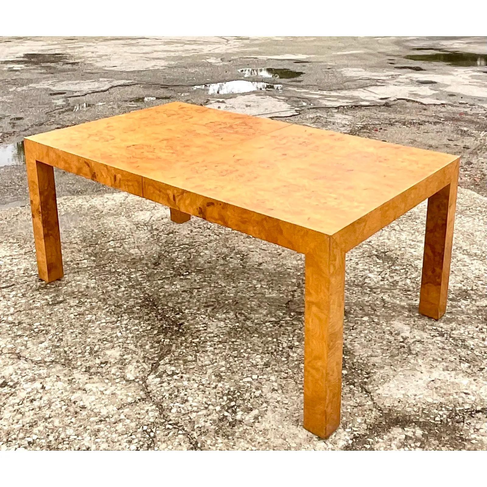 Incredible vintage MCM lane dining table. Beautiful book matched Burl wood makes this a really striking addition to any décor. Two large leaves make it an enormous table for entertaining.