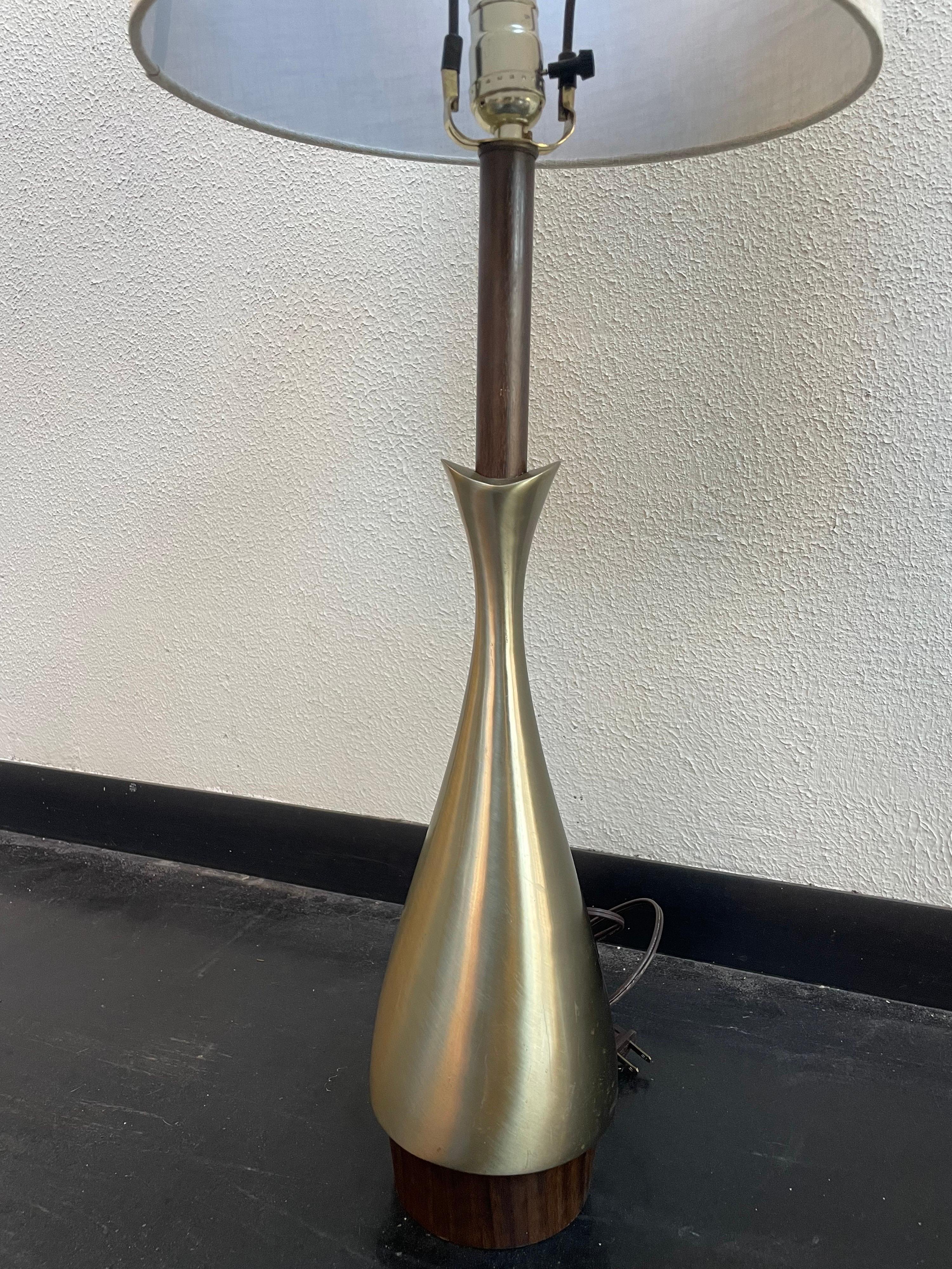 Large vintage table lamps by Laurel and design attributed to Tony Paul. Brass body and walnut detailing. Lamp shade is 11