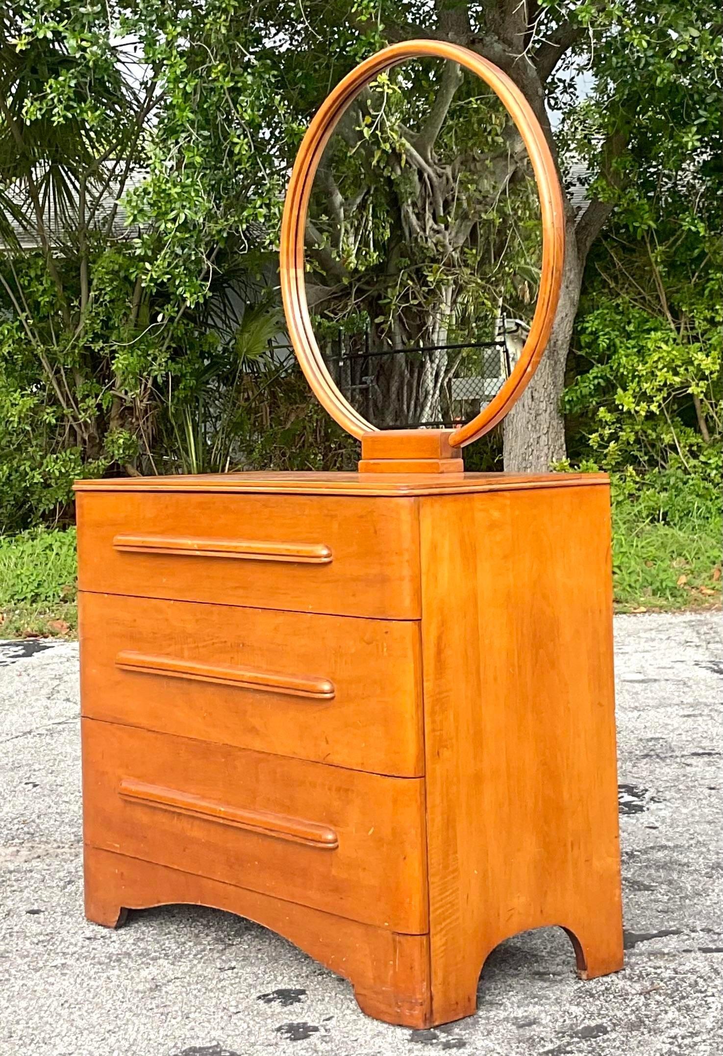 vintage dresser with round mirror