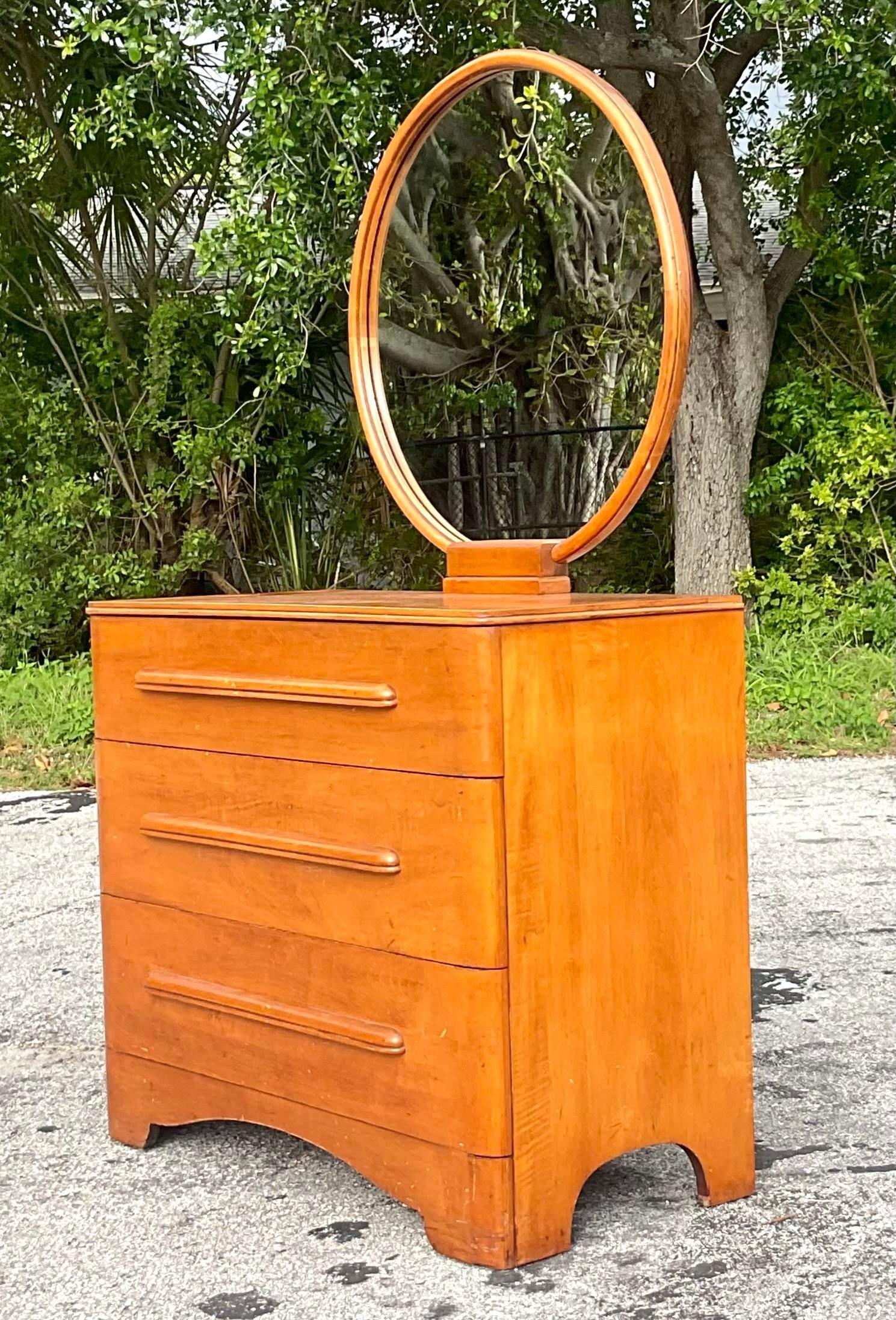 antique dresser with round mirror