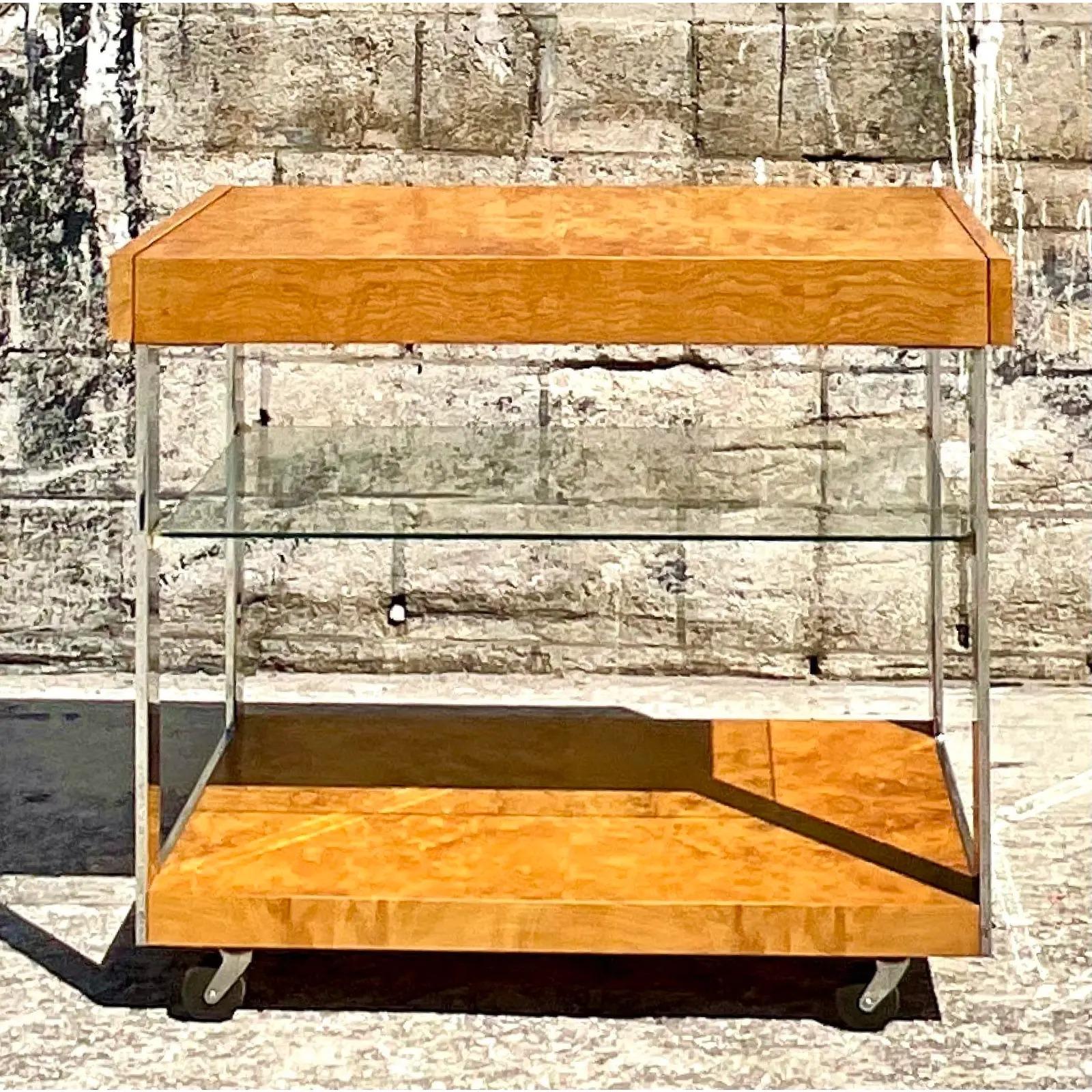 Iconic vintage MCM burl wood bar cart. Made by Lane Furniture as part of their 'Alpha' collection. Beautiful wood breaking detail and sleek classic shape. Extendable arms for additional surface space. Acquired from a Palm Beach estate.