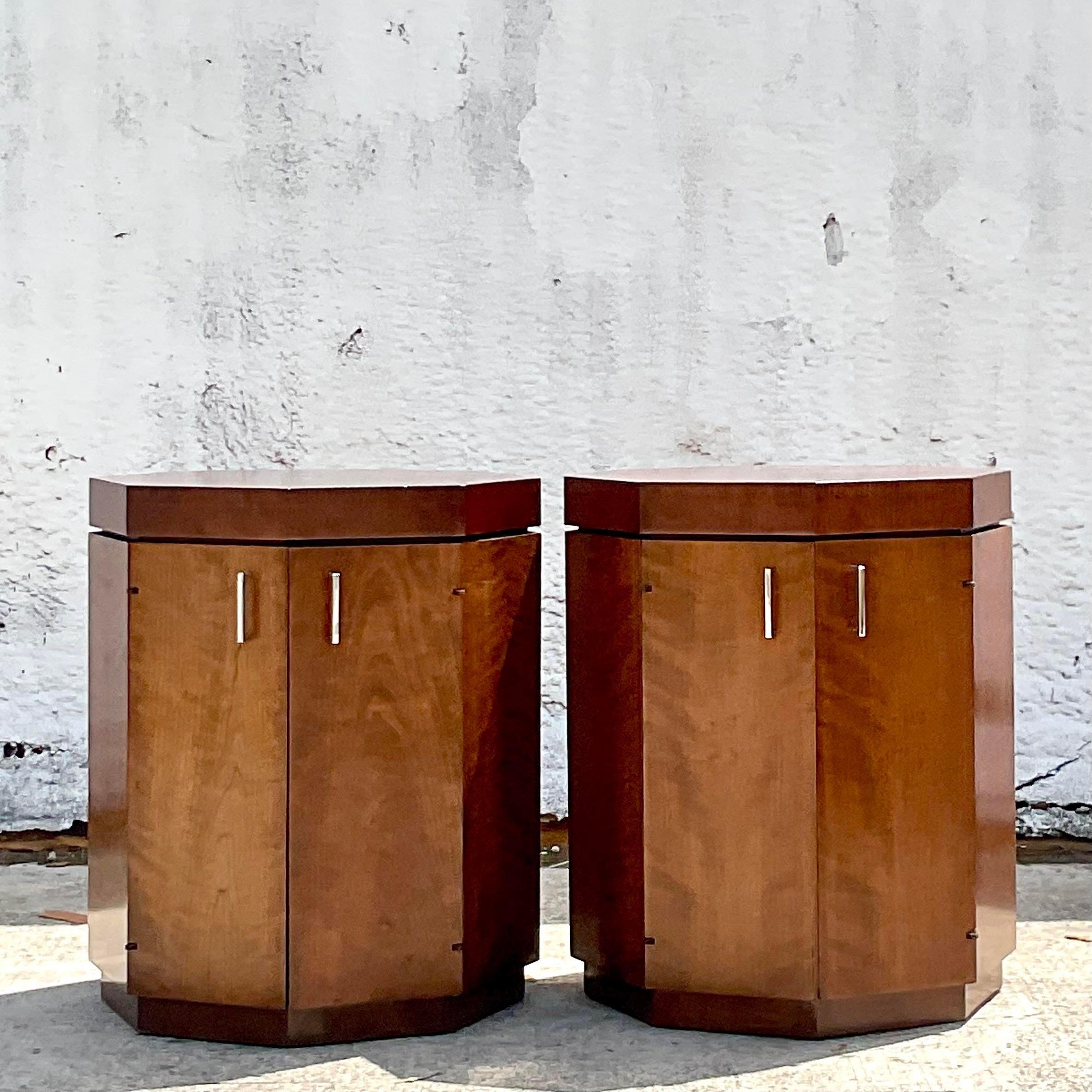 An exceptional pair of vintage MCM nightstands. A chic octagon shape with lots of great interior storage. Done in the manner of Harvey Probber. Perfect as nightstands, but would also make chic side tables. You decide! Acquired from a Palm Beach