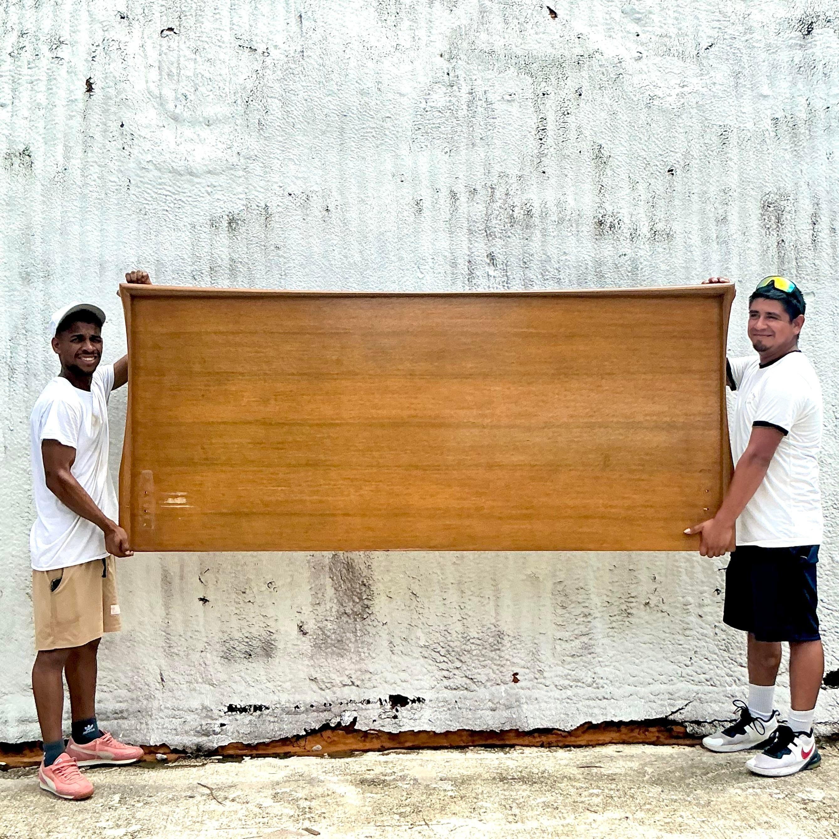 Elevate your bedroom with the timeless style of this Vintage MCM Plank King Headboard. Perfect for American-style interiors, this mid-century modern headboard features clean, horizontal plank detailing that embodies the simplicity and elegance of