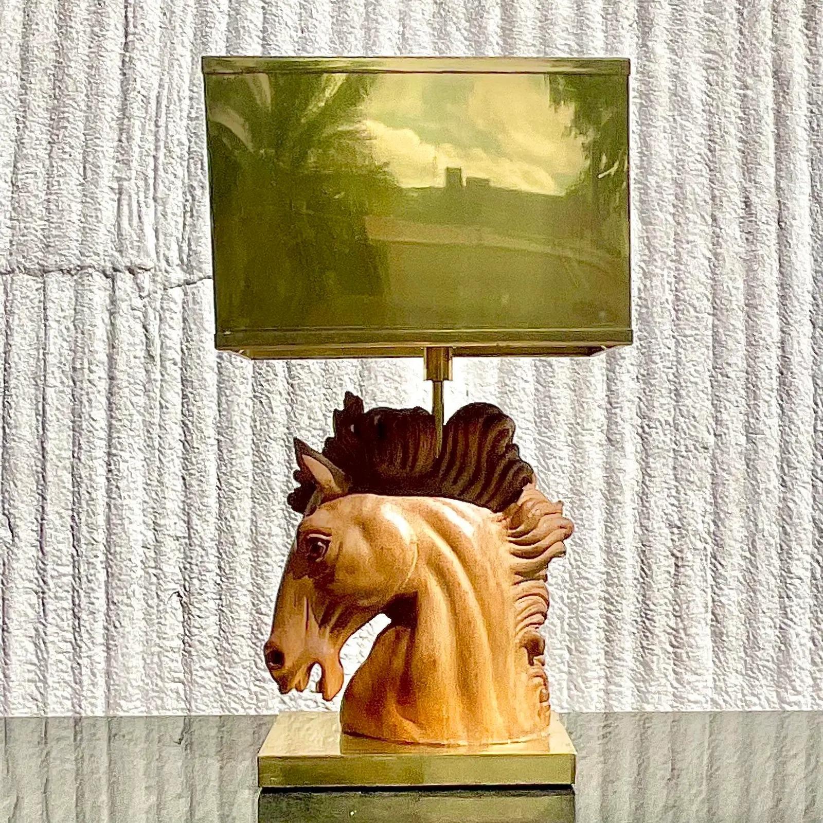 Fantastic vintage Boho table lamp. A fabulous carved horse head with hand painted detail. A chic brass shade with matching brass plinth. Acquired from a Palm beach estate.