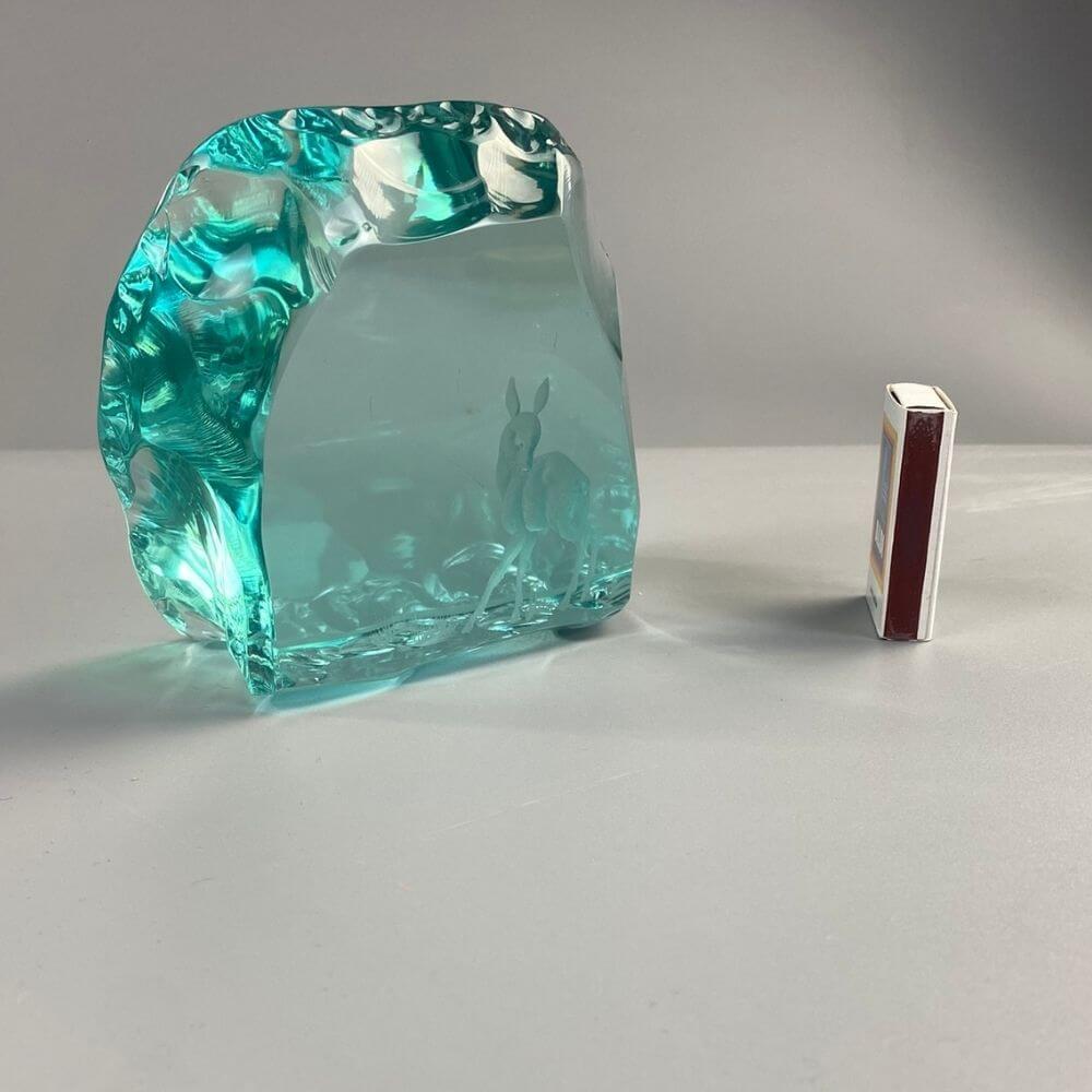 Introducing a Vintage Swedish Glass Sculpture, a stunning relic from the 1960s/1970s crafted in the picturesque Hovmantorp, Sweden. This exquisite piece serves as both a captivating paperweight and a tribute to the artistry of vintage