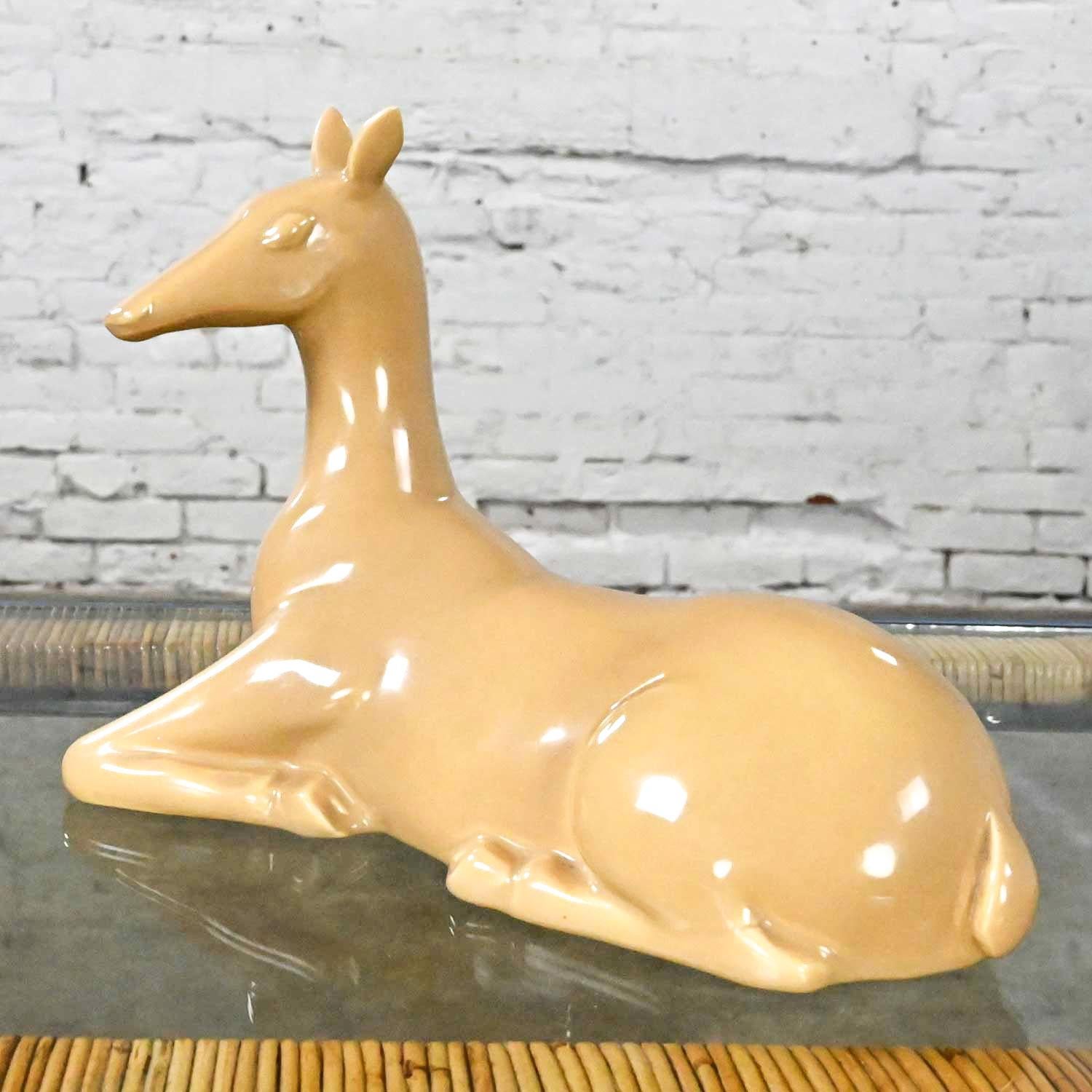 Lovely vintage mid-century modern to modern and Art Deco Revival caramel colored ceramic deer by Jaru California Pottery 1975. Beautiful condition, keeping in mind that this is vintage and not new so will have signs of use and wear. Please see