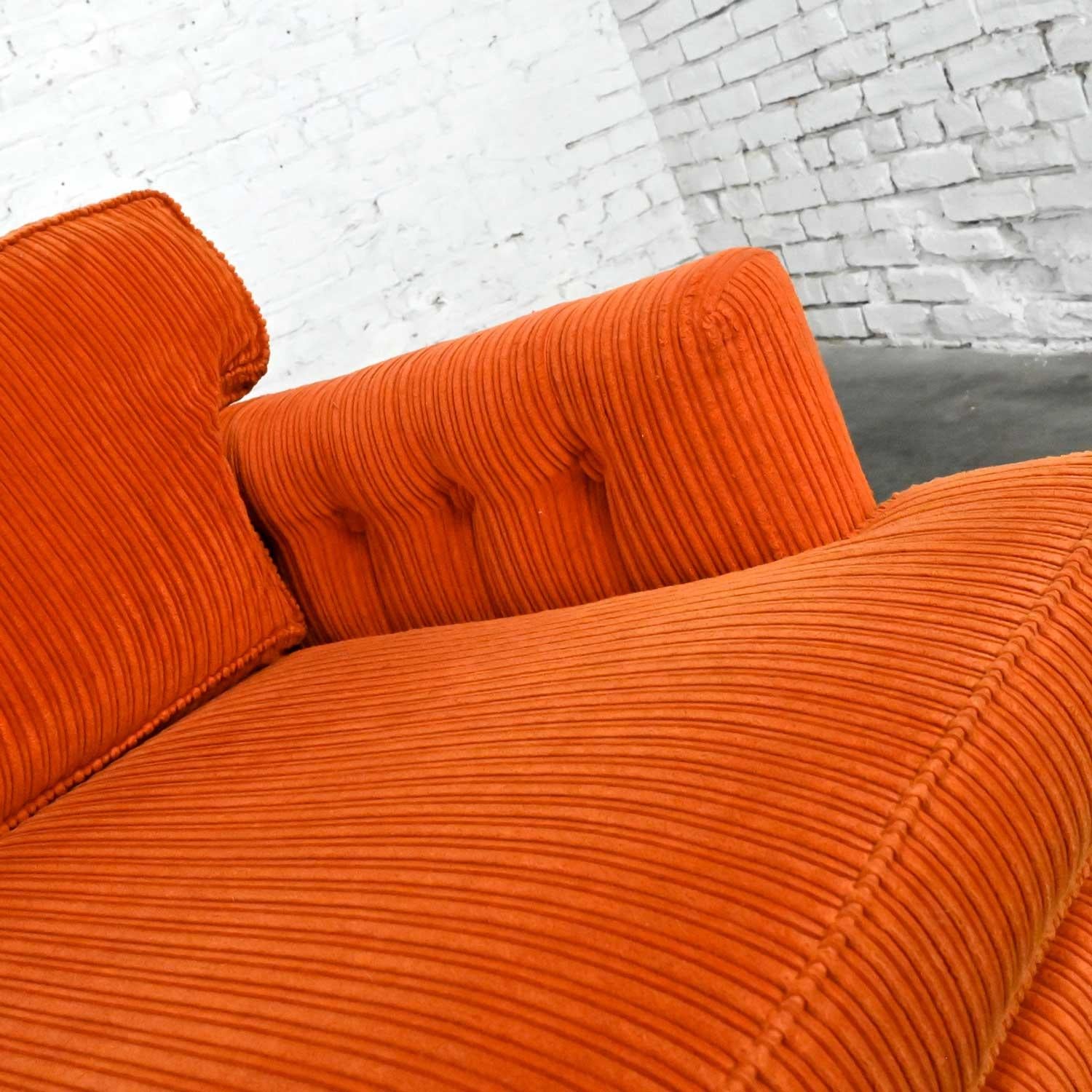 orange corduroy sofa