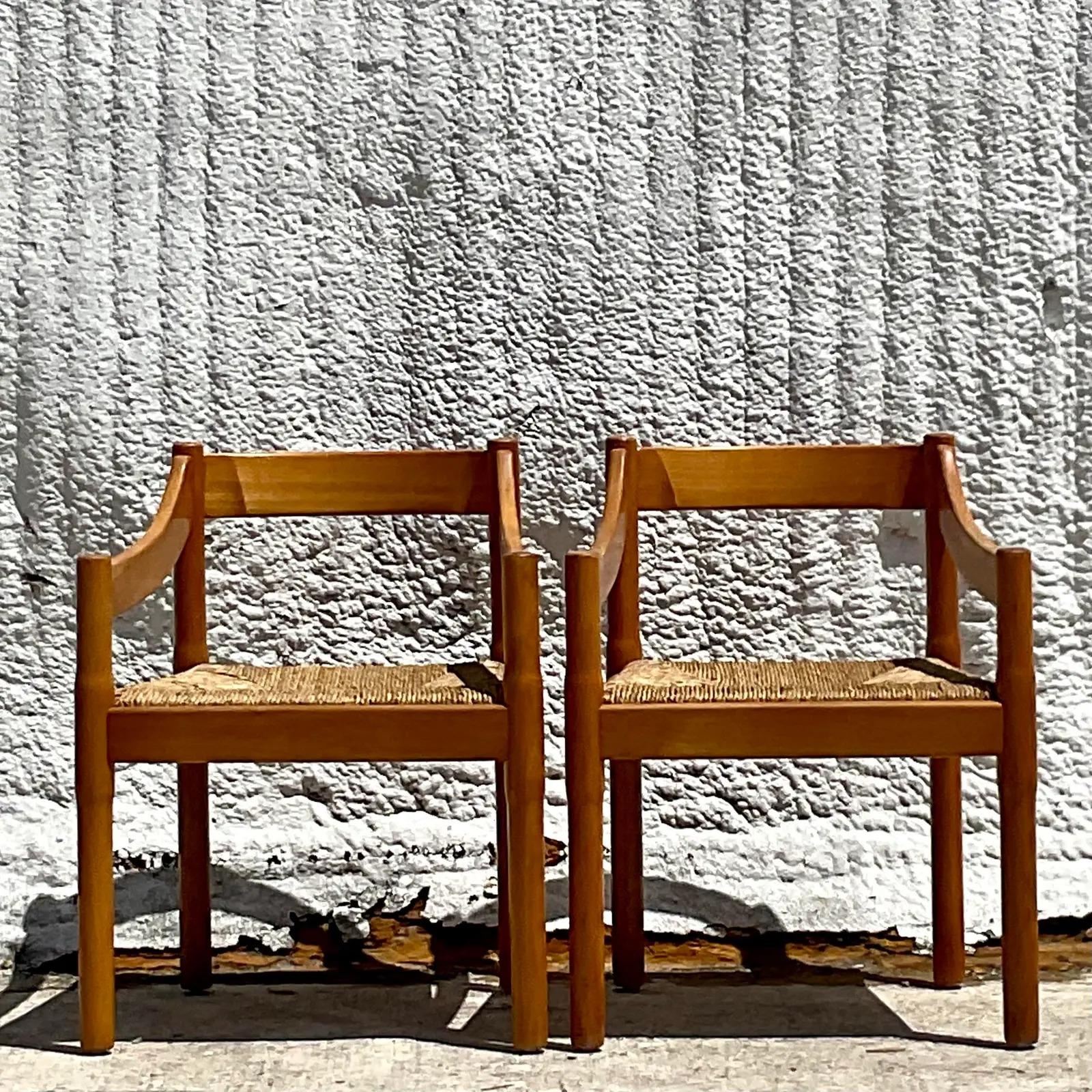 Vintage MCM Yugoslavian Rush Seat Arm Chairs, a Pair In Good Condition In west palm beach, FL