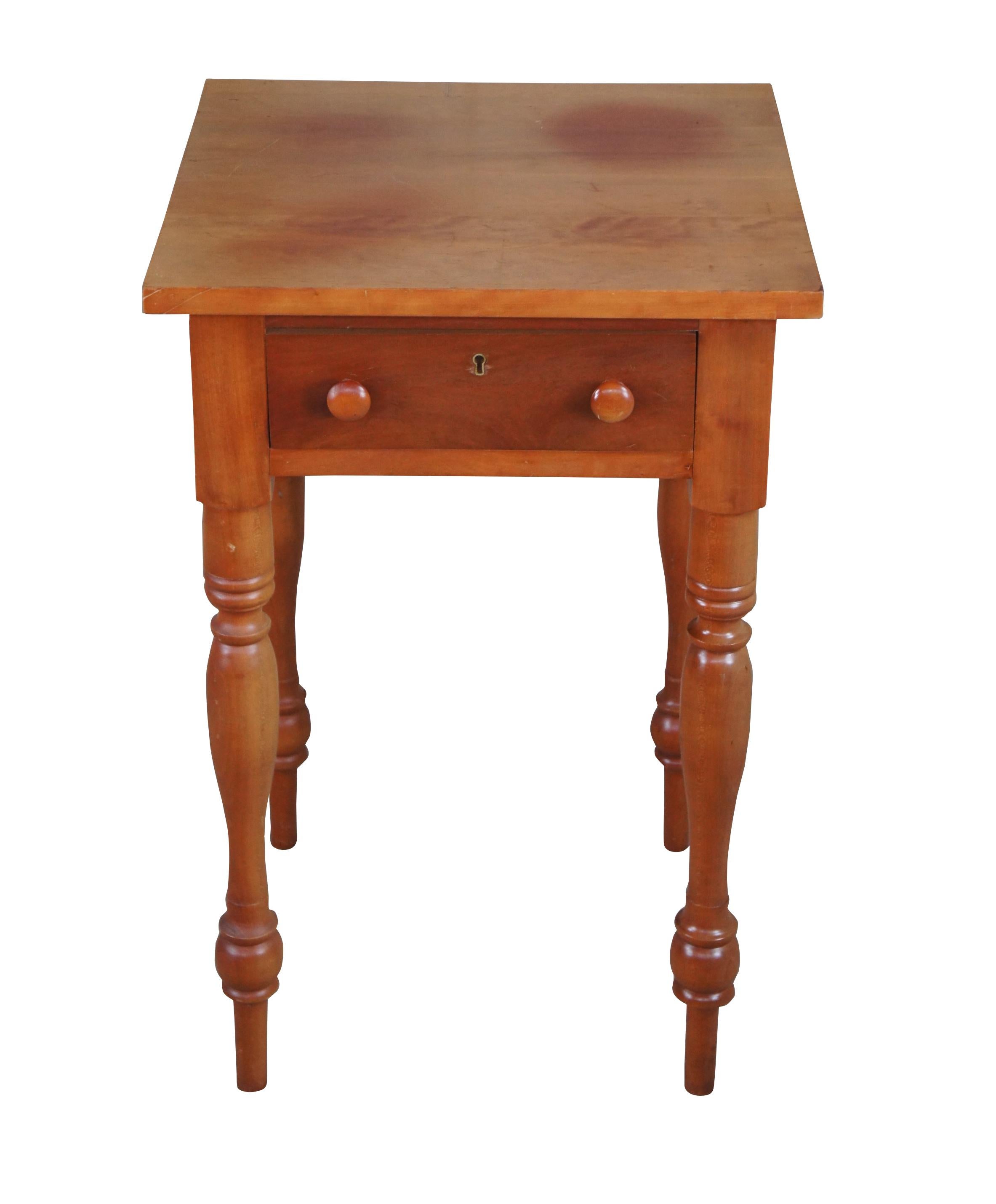 McMahan Furniture Co. Early American side table.  Made of cherry featuring rectangular form with one dovetailed drawer and turned legs.

CAMPBELLSVILLE, Ky. - Eugene McMahan & Son Furniture Co. was started by Eugene and his eight sons in the early