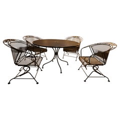 Sedie a botte con molla a spirale in ferro battuto della collezione Meadow Craft d'epoca con tavolo