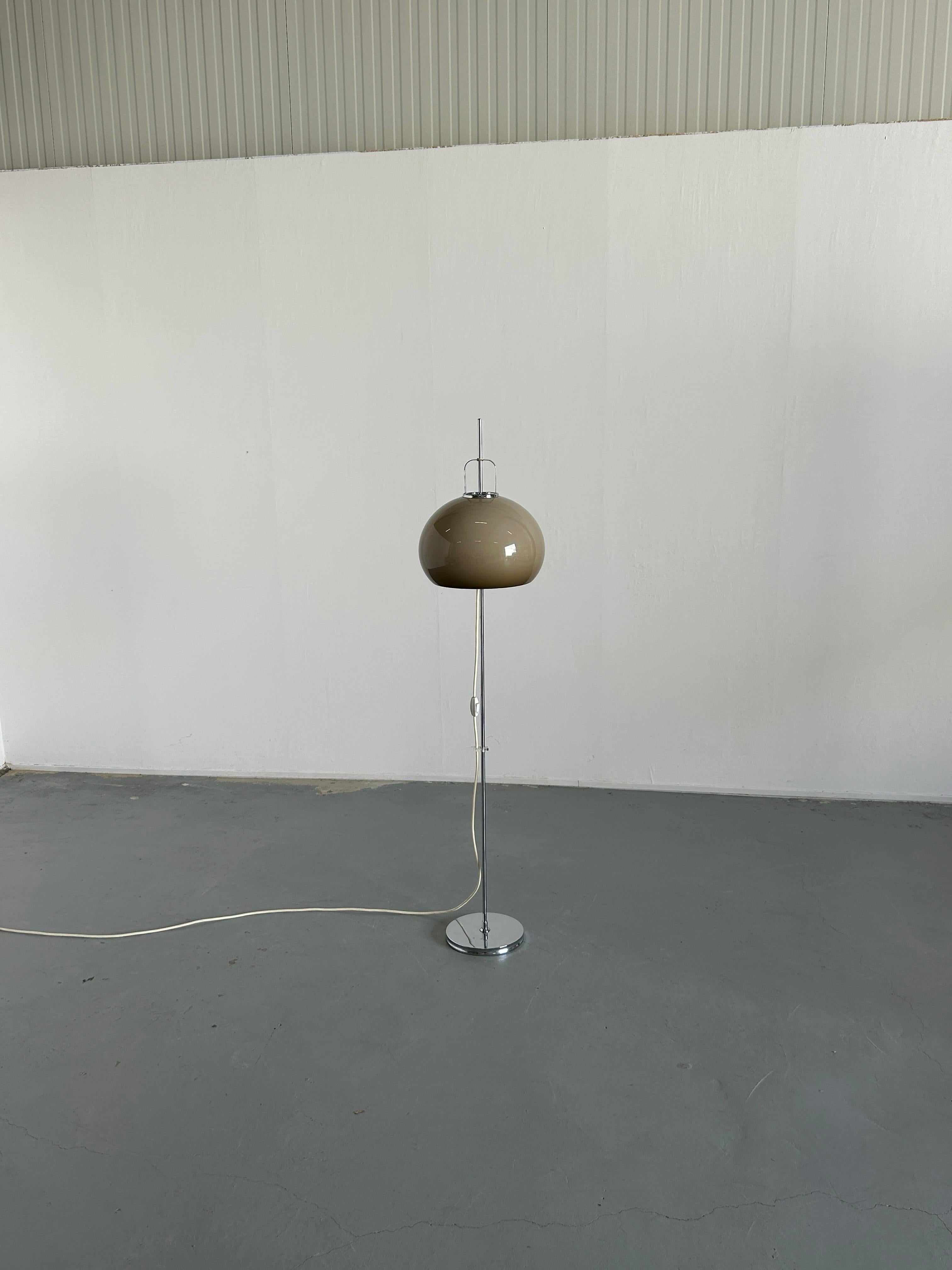 A beautiful brown Mid-Century Modern floor lamp, model 'Lucerna', designed by Harvey Guzzini Studio for Meblo in the 1970s. Made from chromed metal and plastic. Can be adjusted to any height. 

The item is in very good original vintage condition