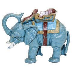 Jouet de collection vintage en fonte mécanique d'éléphant en forme de tirelire