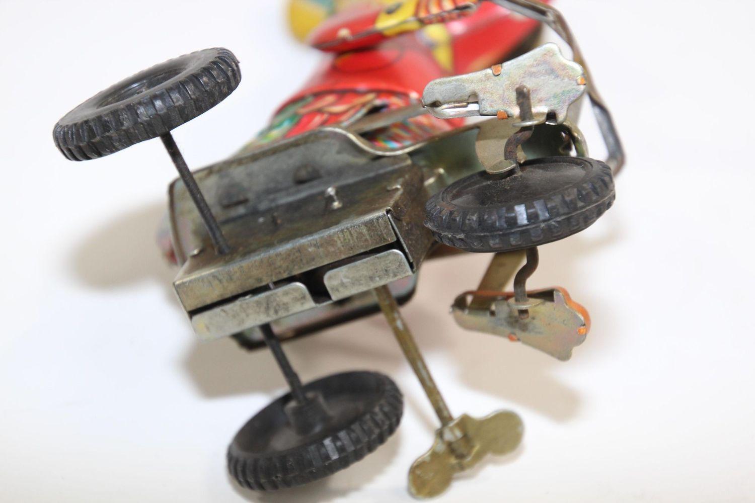 Metal Vintage Mechanical Hand-Painted Wind-Up Duck on Bike