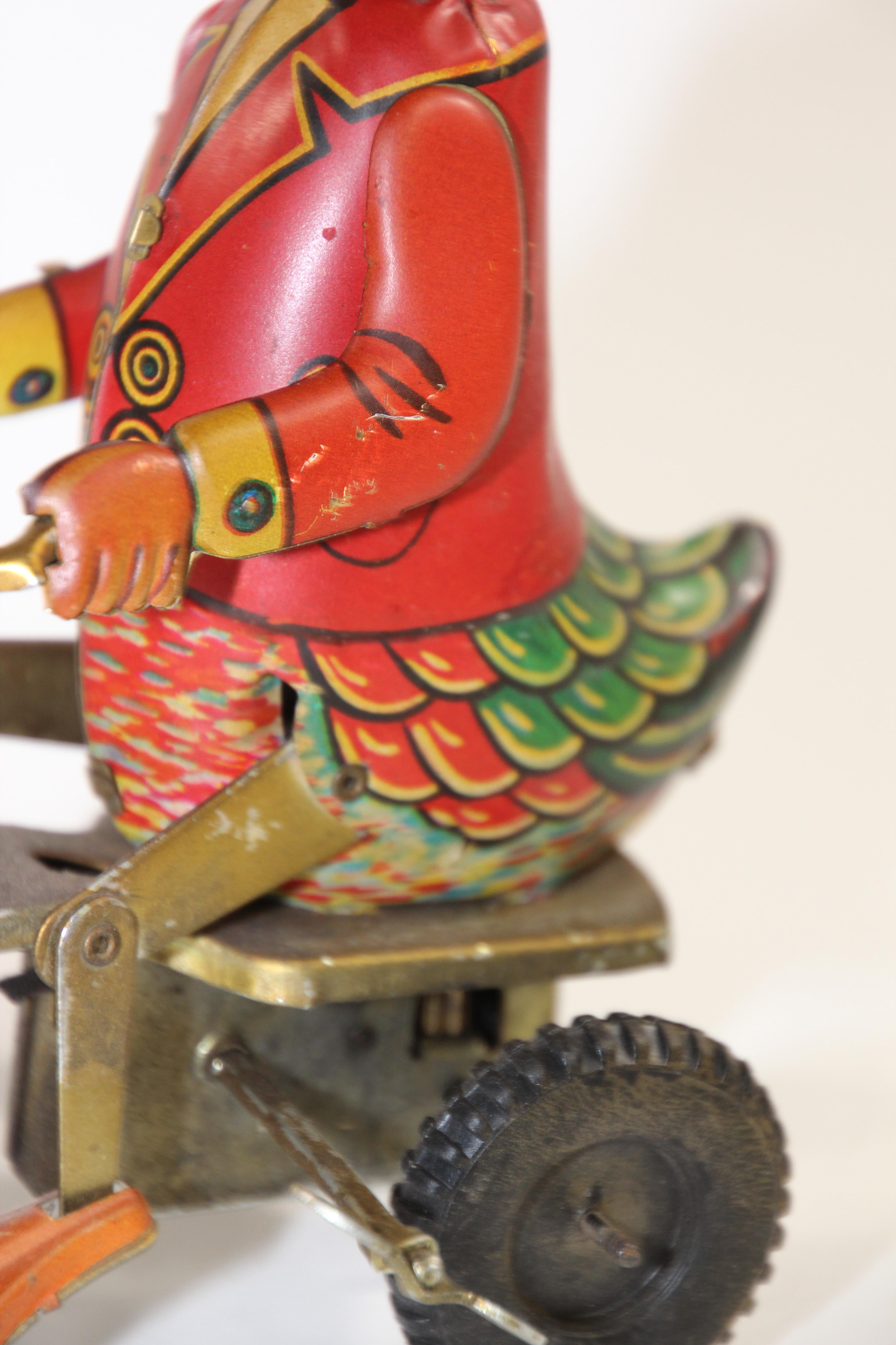 Metal Vintage Mechanical Hand-Painted Wind-Up Duck on Bike