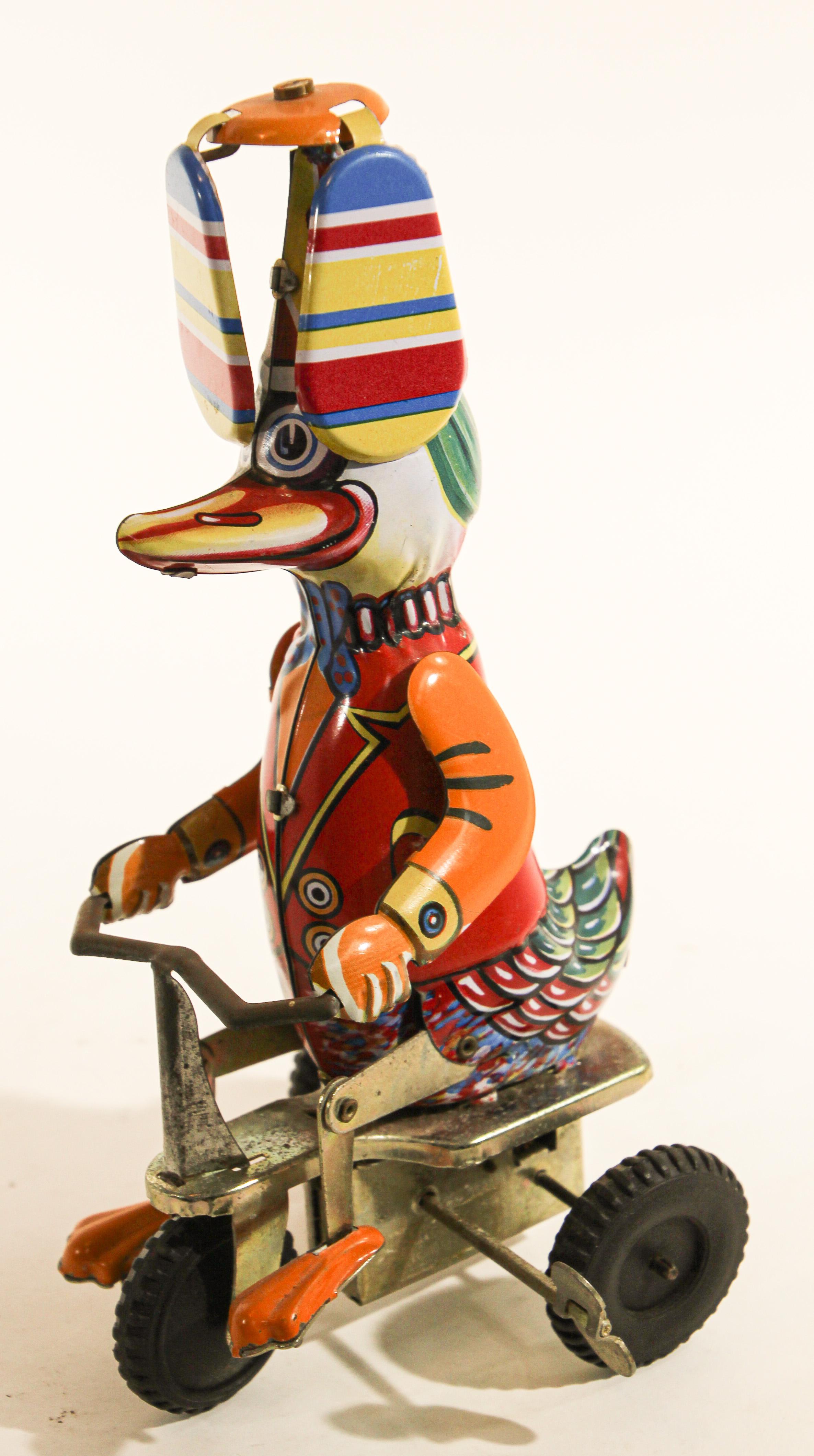 Vintage Mechanical Hand-Painted Wind-Up Duck on Bike 5