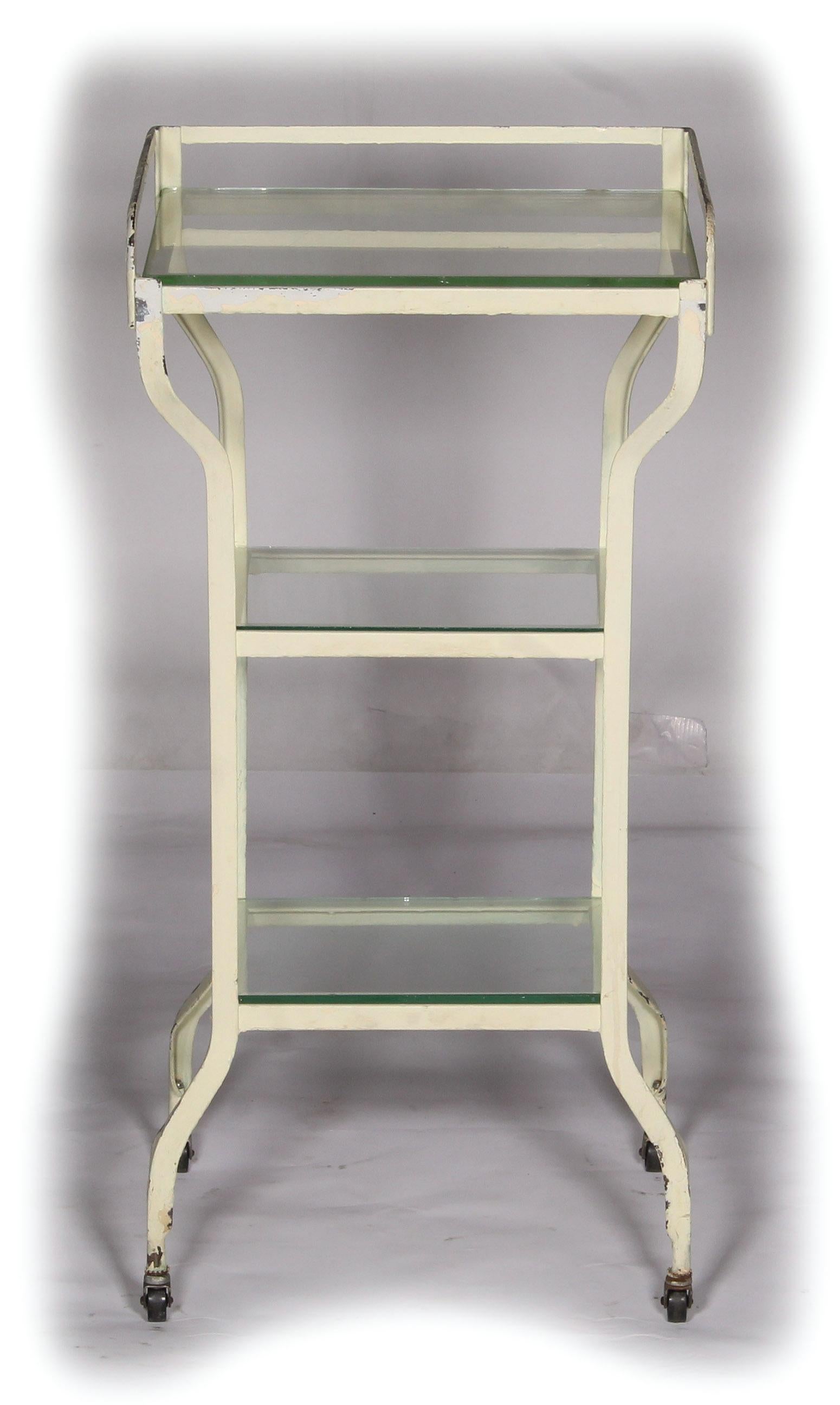 Vintage 3-tier white medical stand on wheels. Also available, matching wider stand.