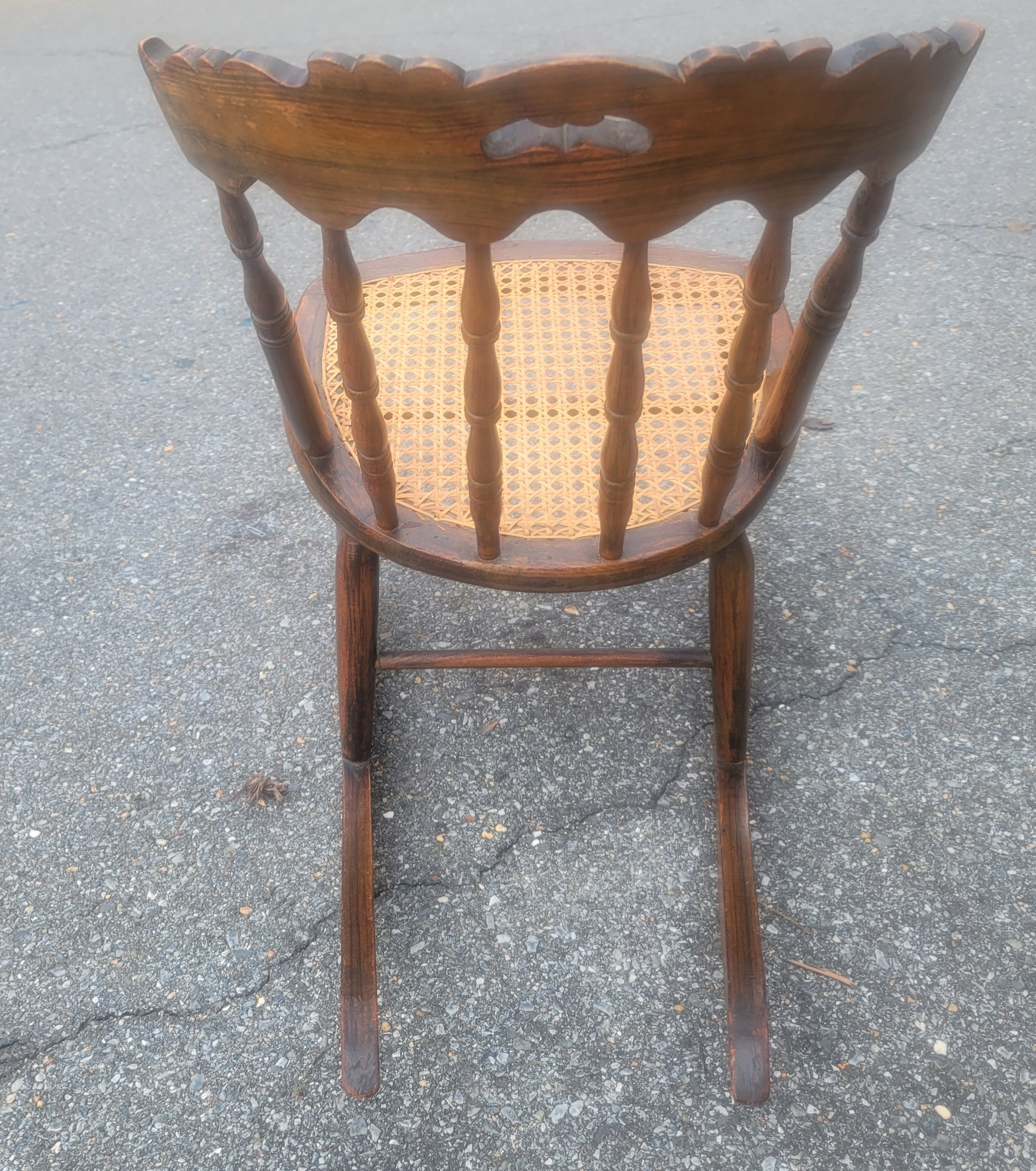 American Vintage Medium Size Tiger Walnut and Cane Seat Rocking Chair For Sale