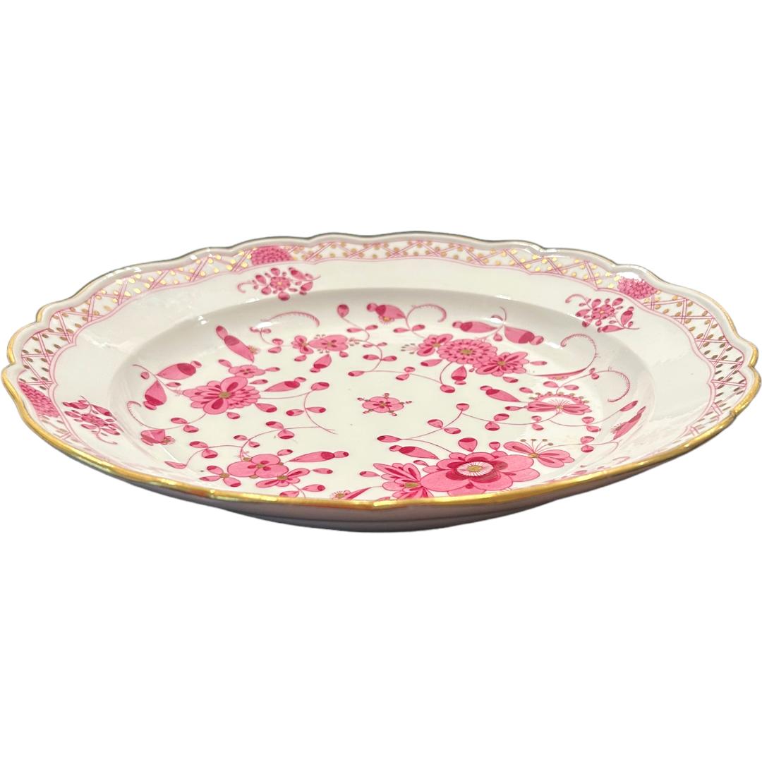 This Meissen fine large porcelain, hand painted bowl is a beautiful addition to any decorative collection.  Its pink floral intricate design and gold scalloped rim and highlights make this large bowl a unique piece. Made in Germany, this bowl is