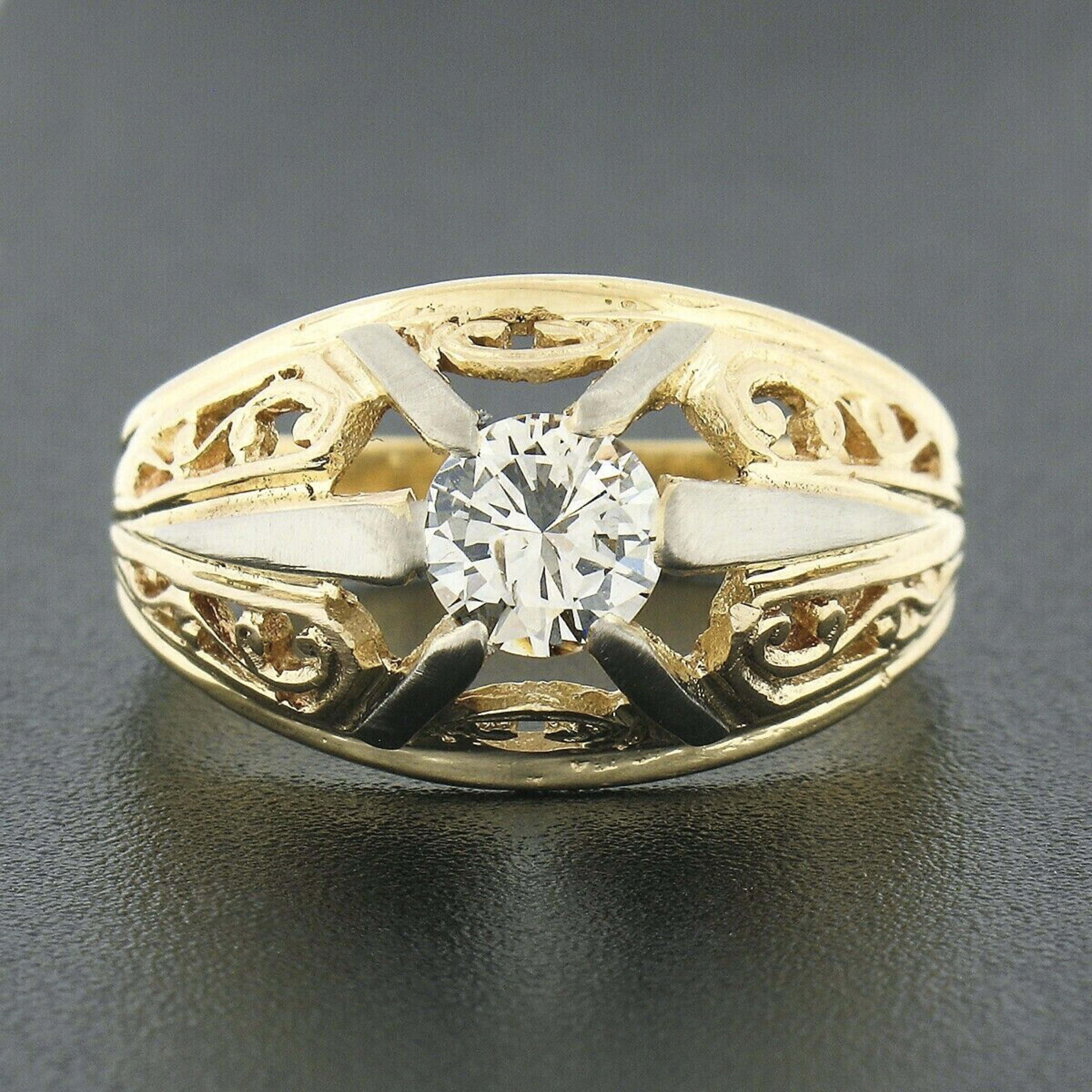 This unique men's vintage ring is crafted in solid 18k yellow gold with white gold prongs that feature a stunning old transitional cut diamond at the domed open center. The fine diamond solitaire displays magnificent amount of sparkle with fiery
