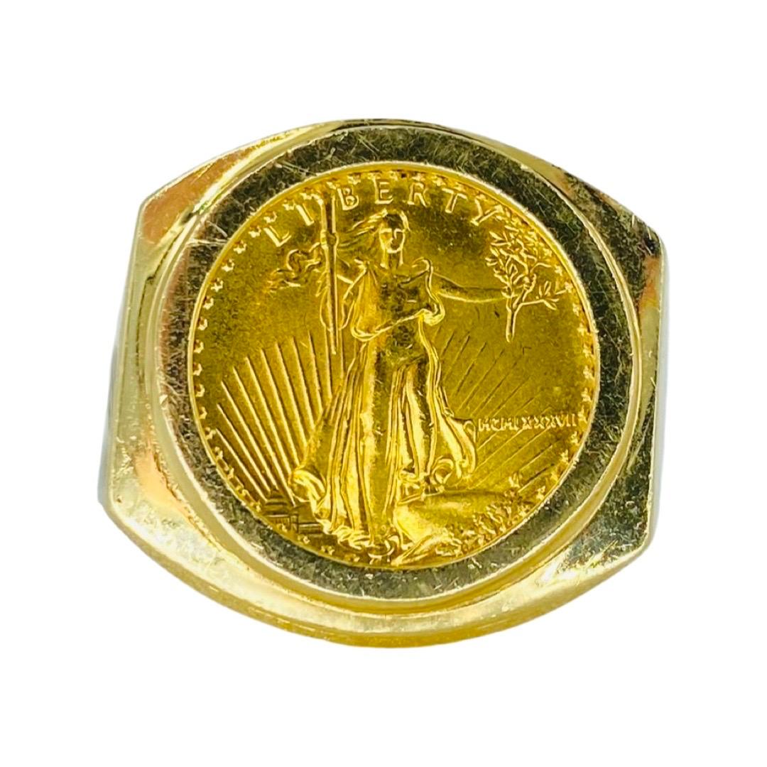 Vintage Men’s 22k American Eagle 1/10oz Coin Ring 14k Gold. The ring weights a total of 12.6g and is a size 10