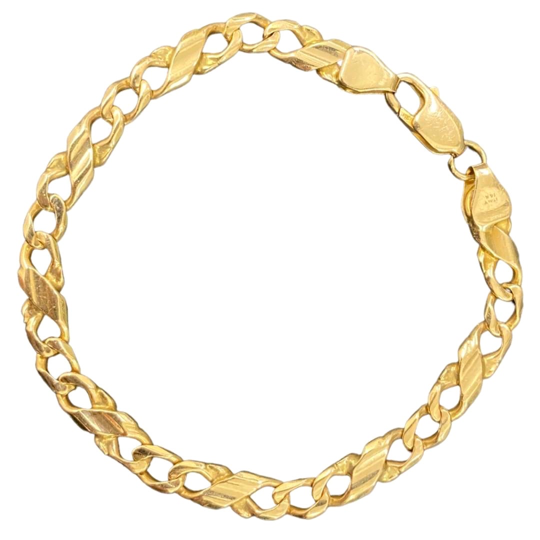 Bracciale d
epoca da uomo con maglie cubane a torsione estesa da 6,5 mm in oro 14 ct.