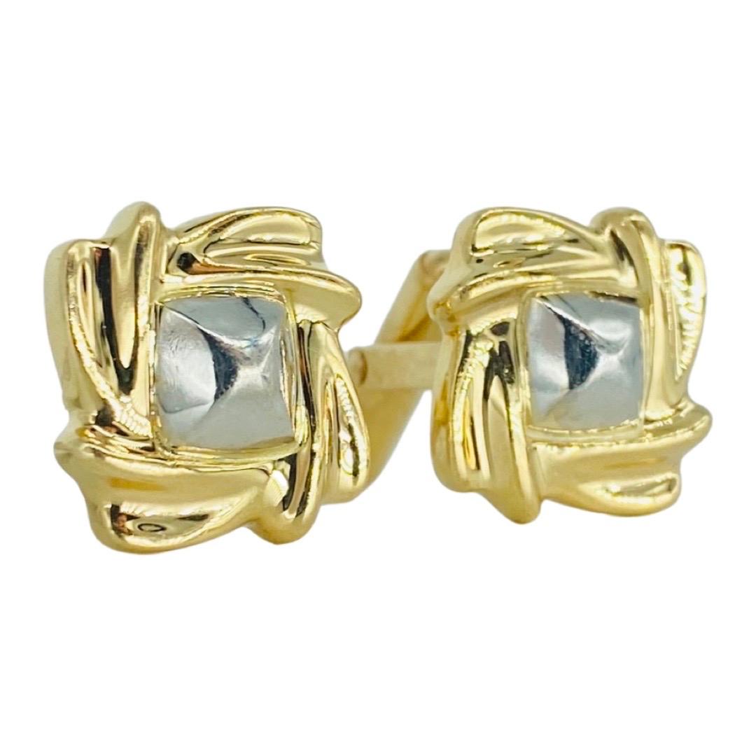Vintage Designer Two-Tone 14k Gold Cuff Links. Luxurious pair of cuff links features a swivel design making then standout in the crowd. The cuff links measure approx 16mm X 16mm
The total weight of the cuff links is 14.2 grams