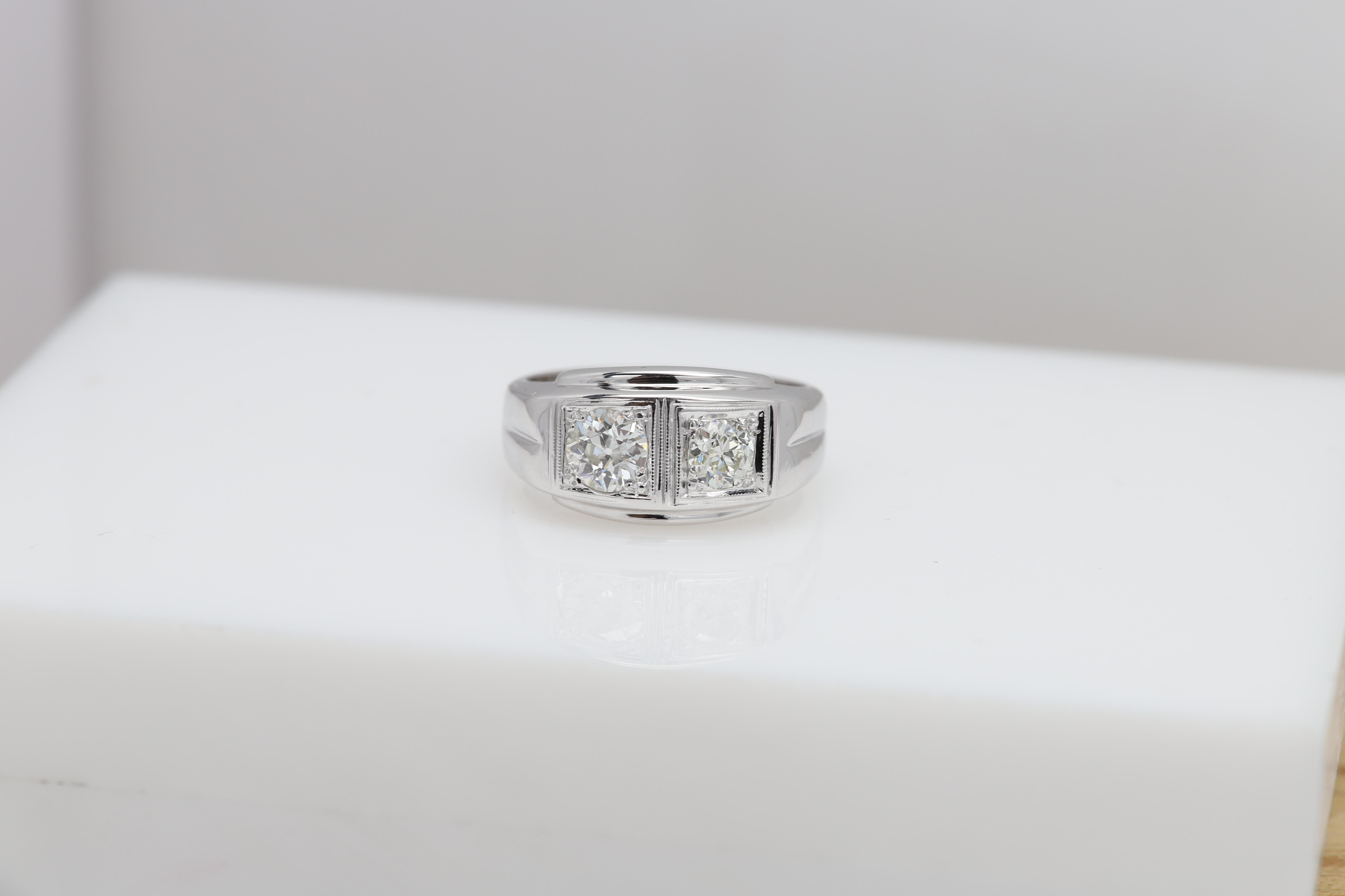 Vintage - pre- Owned Good almost as new condition
Center 2 stones Natural Diamonds Old mine cut Style facets 
Round shape 
stone #1) approx 6mm 0.75-0.80 carat I-J - VS2
stone #2) approx 5.4mm 0.60 - 0.65 carat H-I - SI1
Total approx 1.20