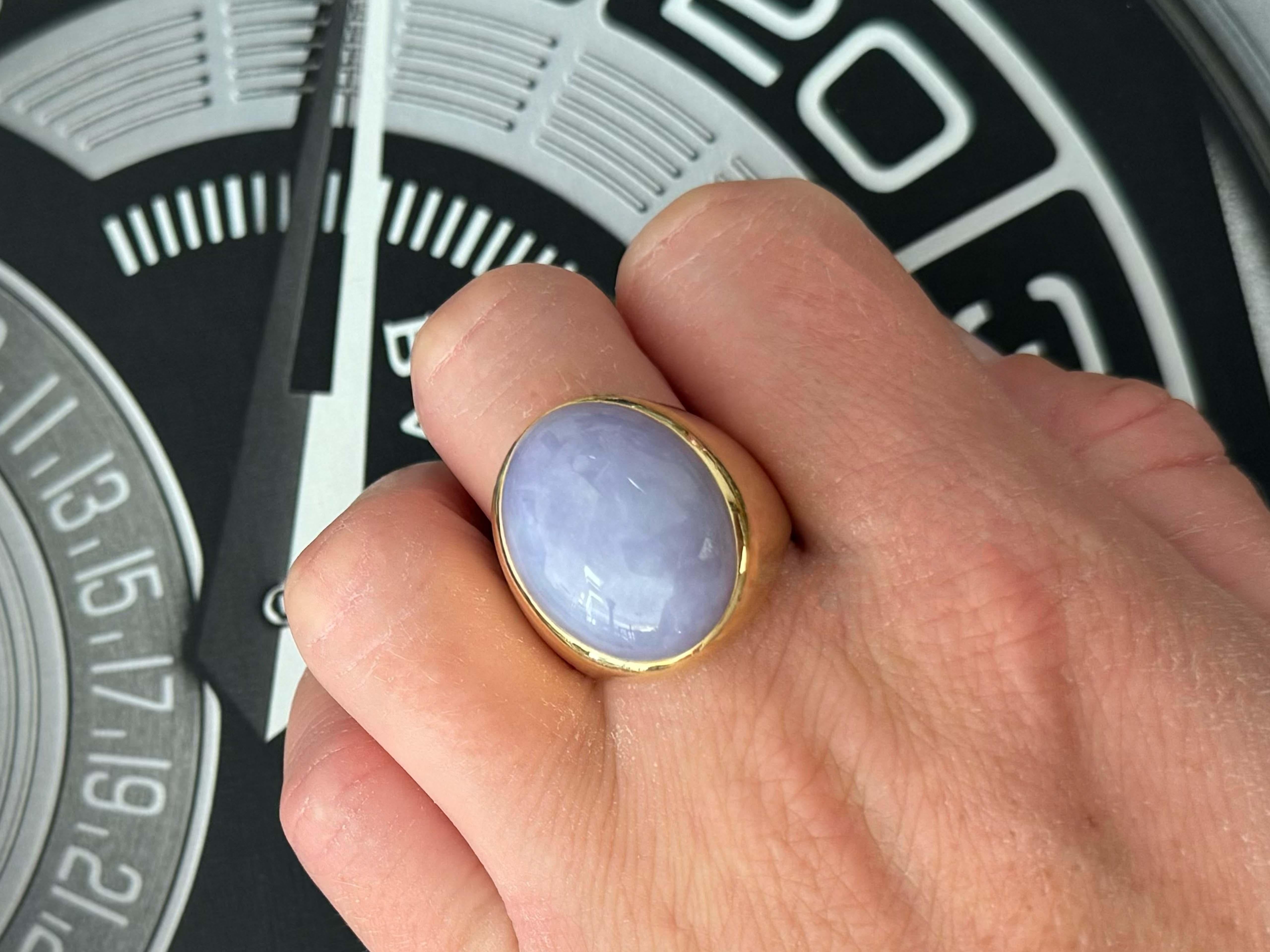 Photo of the ring on the hand is the most accurate jade color!!
​
​Ring Specifications:

Metal: 14k Yellow Gold

Total Weight: 26.7Grams

Jade Carat Weight: ~ 30 carats

Jade Measurements: ~ 23 mm x 18 mm x 8.1 mm

Ring Size: 9 (resizable)

Stamped: