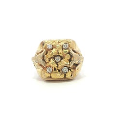 Bague vintage pour homme en or jaune, sertie de diamants « nugget » d'un poids total de 0,20 carat, avec deux têtes de bélier