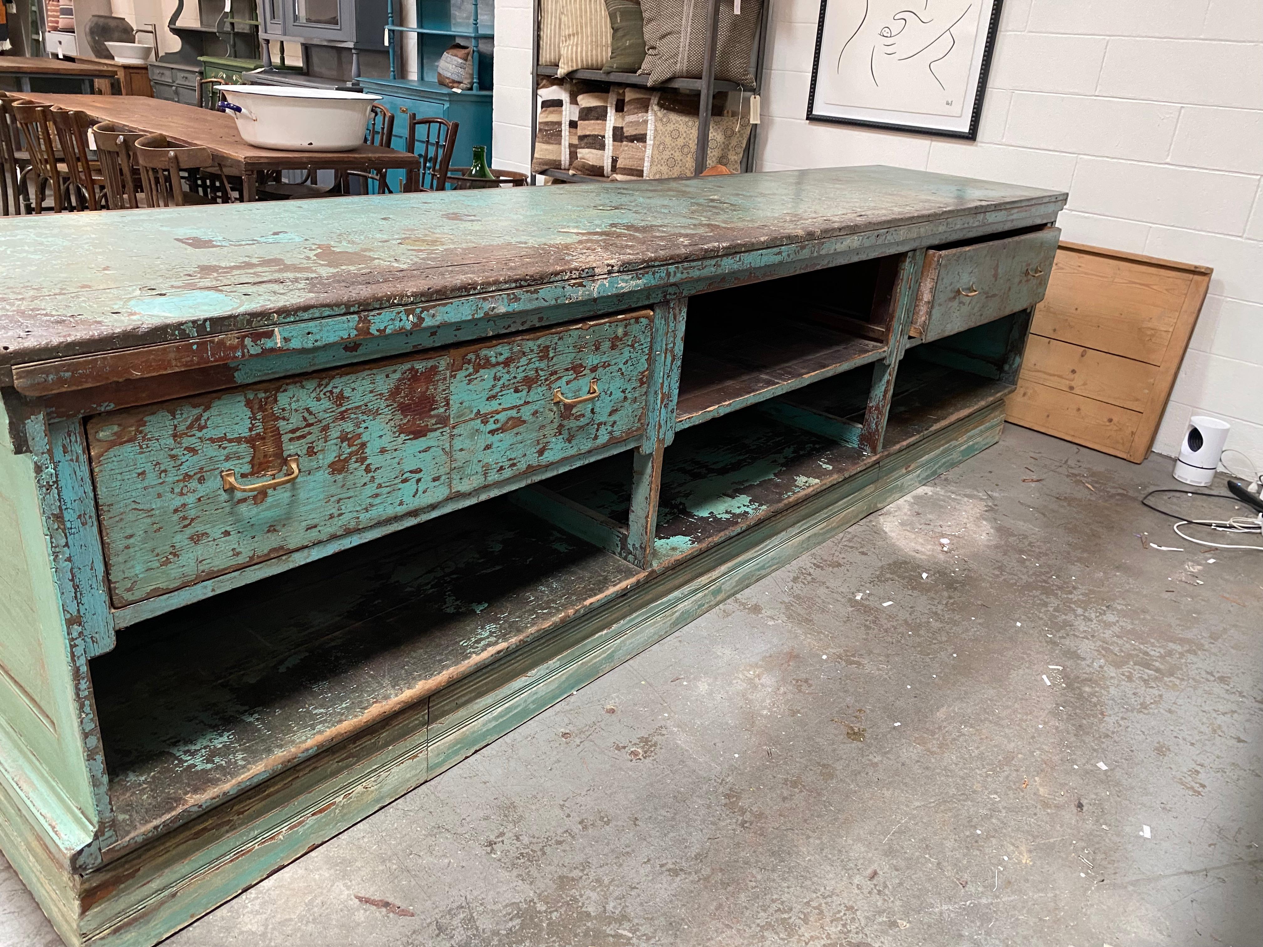 Vintage Merchant's Counter with Drawers and Hammered Tin Details In Distressed Condition In Los Angeles, CA